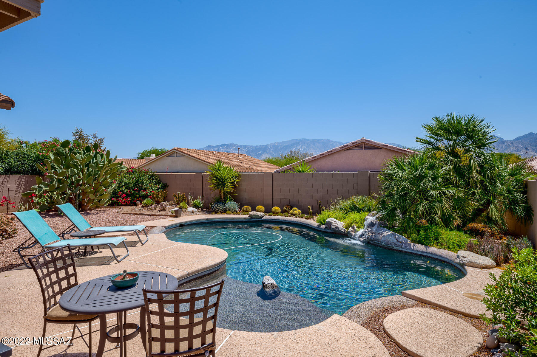Mountain Views. Gated community. Low HOA monthly dues. Furnishings and wall art included in purchase price if desired or furnishings may be removed before close of escrow.
3 bedrooms, 2 full baths. Pebble Tec pool with waterfall. Sun will set on the front of the home for cooler evenings in the back yard!
Seller is out of country. Home is being sold in it's as-is condition. Please read scheduled repairs in agent remarks.
