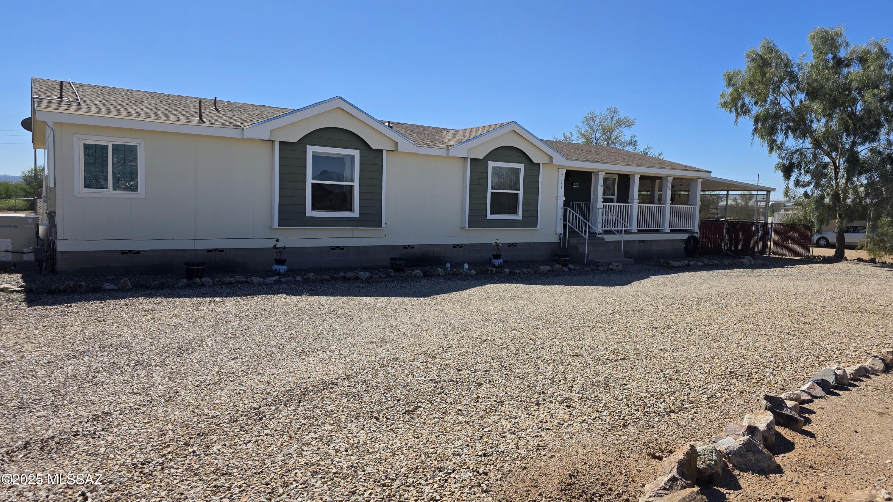 Incredibly maintained home, perfectly situated on just under an acre in the beautiful desert subdivision of San Joaquin Ranch Estates. This home is in turn-key condition thanks to notable recent upgrades, including a new HVAC in '22, a new roof in '23, and installed solar in '24. Seller to pay off the existing solar loan at close of escrow, allowing the Buyer to enjoy immediate, significant savings on their monthly electric costs and to own the system outright from day one!!! On the inside, the spacious kitchen is a chef's dream with an island with shelves, considerable cabinets and countertop space, a breakfast bar, and built-in desk, all adjacent to the dining room. Retreat to the spacious primary suite which boasts a walk-in closet and a luxurious bathroom featuring a garden tub, separate shower, and two sinks. With views that stretch for miles, the outside is just as enticing, offering a large covered back patio for shade, a cozy wrap-around front patio for viewing sunrises, and inner and outer fenced yards. Plus, you'll love the extra utility provided by a 10' x 10' storage shed and a 12' x 16' shop, both equipped with electric power. With a low-care landscape and a place to park your RV, this beautiful home is ready to be enjoyed! Buyer to verify square footage.  Previous listing states 1917 sq. ft.  Assessor states 2176.