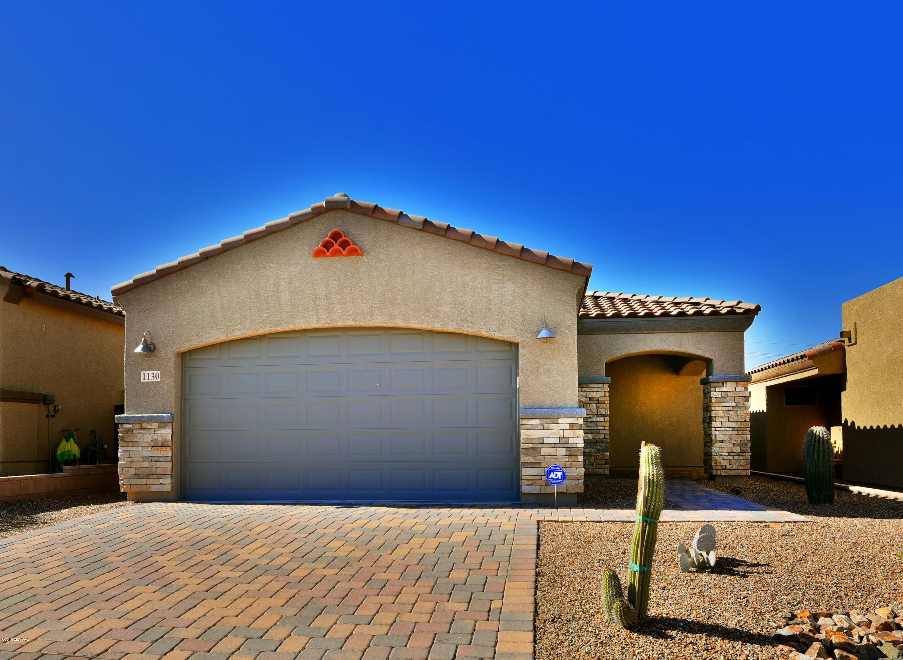 Amazing East side 2/2 built in 2017 by A.F. Sterling! 1375sf home loaded with luxury finishes including; porcelain tile flooring, high ceilings, lots of natural light, and much more. 

An open floor-plan with extensive tile flooring provides max comfort. Chef's kitchen features an efficient layout with custom white cabinetry, SS appliances, finished in white granite (with an under-mount sink). 

Great room provides ample room for entertaining and/or oversized furniture with lots of natural lighting. Split bedroom plan provides maximum privacy with the guest bedroom optioned as a ''bunk room'' (appx double the size of a normal bedroom). Perfect for almost any hobby/ office space/ media room. 

Outside offers low care landscaping, views, + more!

Priced to sell schedule your showing