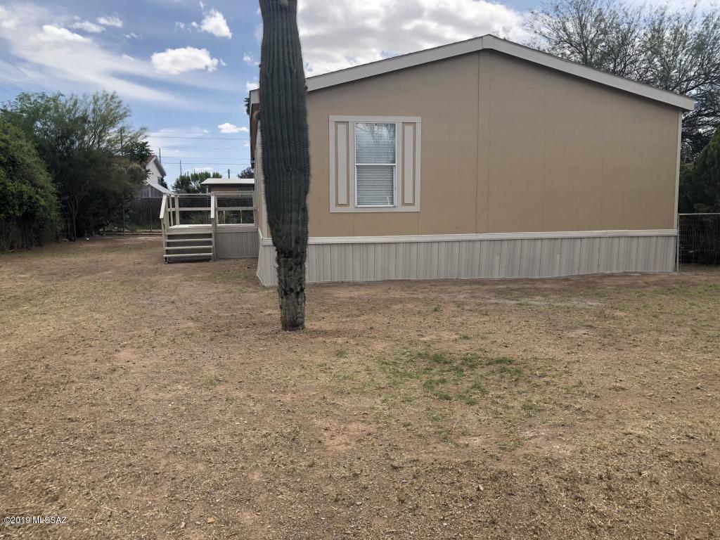 This is a beautiful manufactured home 4 bedrooms/2 bathroom. New paint outside, New floor throughout the house, New baseboard throughout and well maintained and ready for a new family, this great home has a very open floor plan with plenty of room for your family. This home ready to move in. Great location close to shopping, transportation and schools and much more.