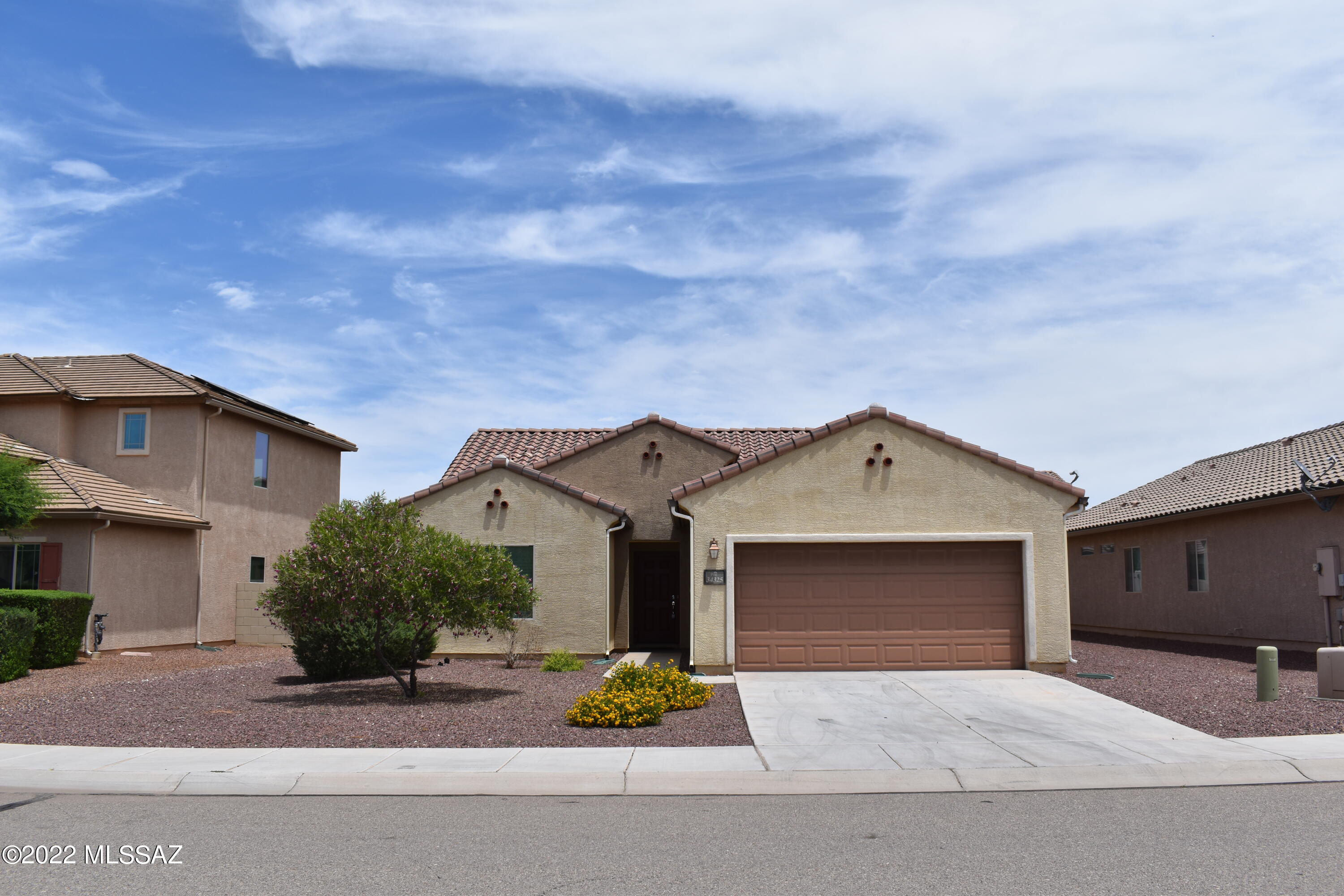 Red Rock Village - Spacious single-story home with split bedroom floor plan. Large bedroom with garden tub, separate shower, two sink vanity, large closet.
Great room with lots of natural light, kitchen with island, stainless steel appliances; refrigerator, dishwasher, microwave, electric stove/oven. 
Laundry room with washer and dryer. Carpet and tile throughout. 2 car garage. Mature vegetation in front yard.  Community pools, water Slides, skate park, dog park, basketball, beach volleyball and walking paths nearby. Pets will be considered. Close to elementary school. Easy access to I/10 Interstate and Red Rock Exit.