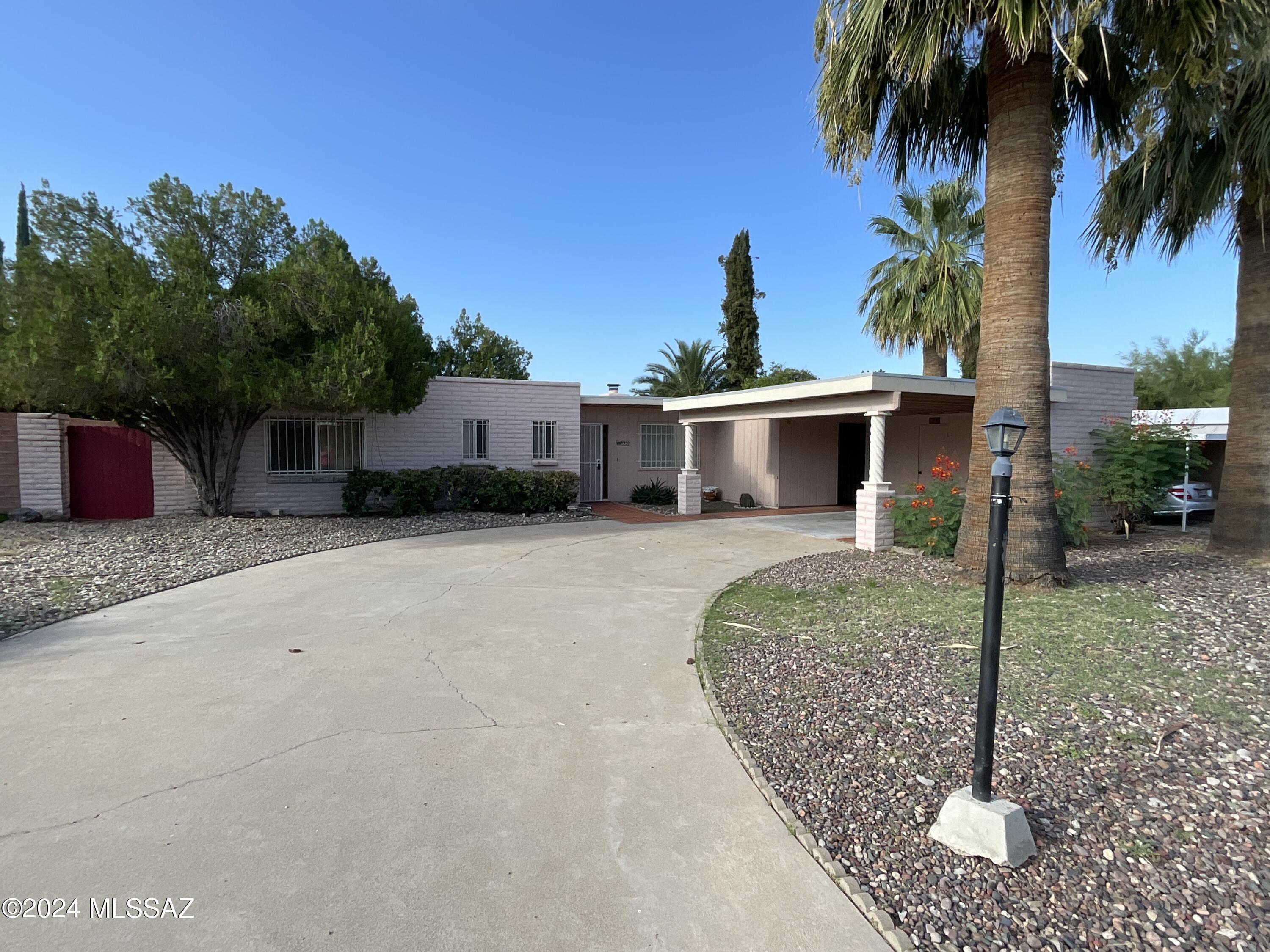 Welcome to this attractive Eastside Home in Tucson, AZ! This charming 3 bedroom, 2 bathroom house is located in a prime spot that backs to a golf course, offering relaxing views and a peaceful atmosphere. The spacious living and dining rooms provide ample space for entertaining guests or relaxing with loved ones. The two car carport and storage area ensure that you have plenty of room for all your belongings. Enjoy the screened patio, perfect for enjoying the beautiful weather year-round. The gas stub for outdoor BBQ makes it easy to host cookouts and gatherings. Cozy up by the fireplace on chilly evenings, and stay cool in the summer with central AC. Don't miss out on this fantastic opportunity to make this Eastside Home your new oasis!