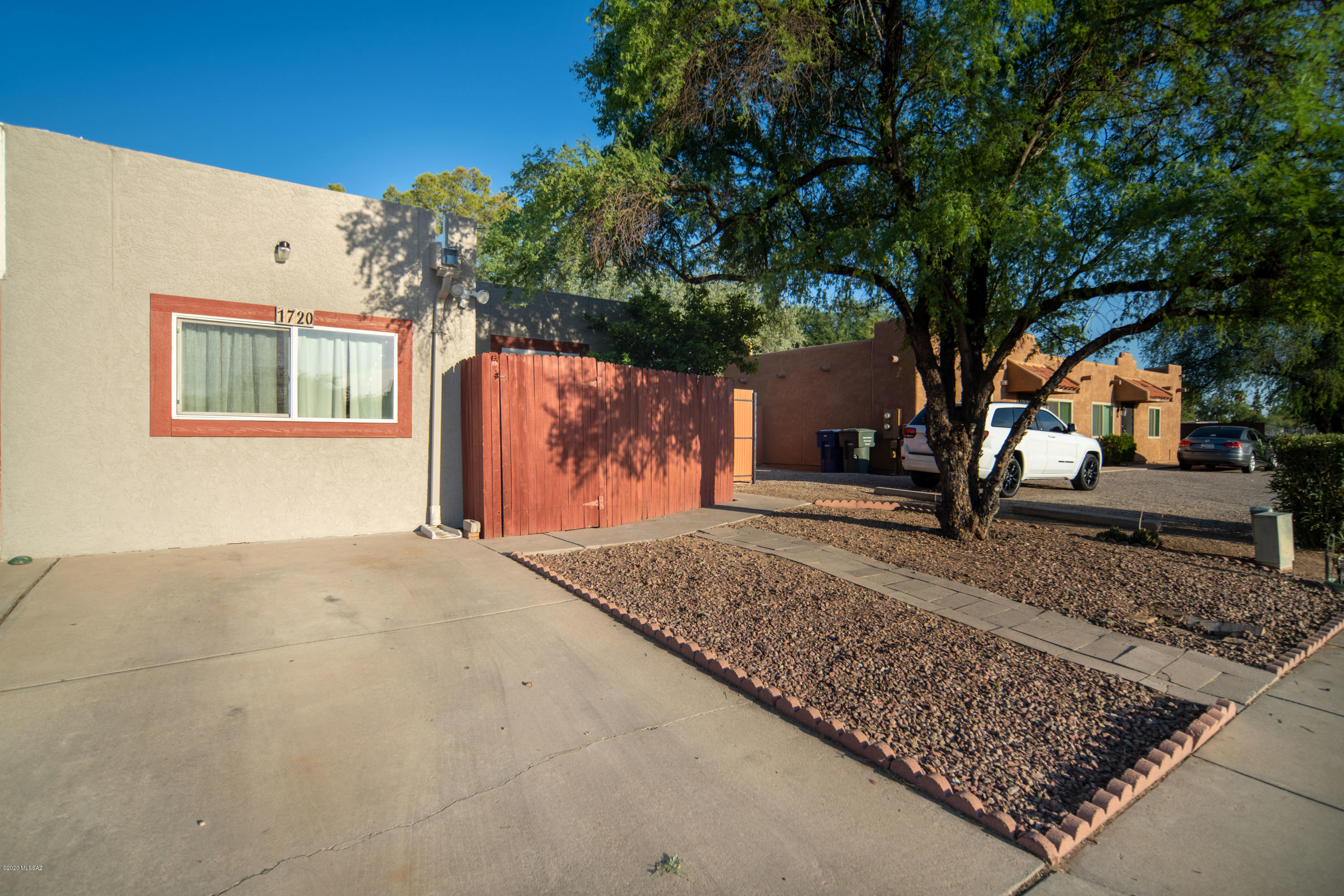 Home is range priced. Seller will accept or counter offers between $177,500-197,500.
This unique former model home has tasteful upgrades & personalized touches throughout. Great Centrally located 3 bed, 2 bath features an open floor plan living room and kitchen, where you'll find a nice sized kitchen updated w/ new LED lighting. Same meticulous owner for almost 30 years. The home still contains its original charm with updated tile throughout, new LED lighting, plumbing fixtures, newer AC & Heat, Water harvesting with custom gutters, New windows & more. The east facing back yard is the perfect shady spot to enjoy the screened porch or grill out of the sun (spa is as is), or enjoy front/south courtyard in warm winter sun. The roof has just been redone, Newer paint inside & out, NO HOA. Plumbed for gas dryer, also gas stove would be an easy add with meter outside kitchen.
Centrally located is close to almost everything. Tucson Medical Center (TMC), Crossroads Plaza, Sprouts, Trader Joe's, and PetSmart are all less than 5 minutes away. Here you'll be within 10 minutes from Park Mall, the University of Arizona and 15 minutes from downtown Tucson.