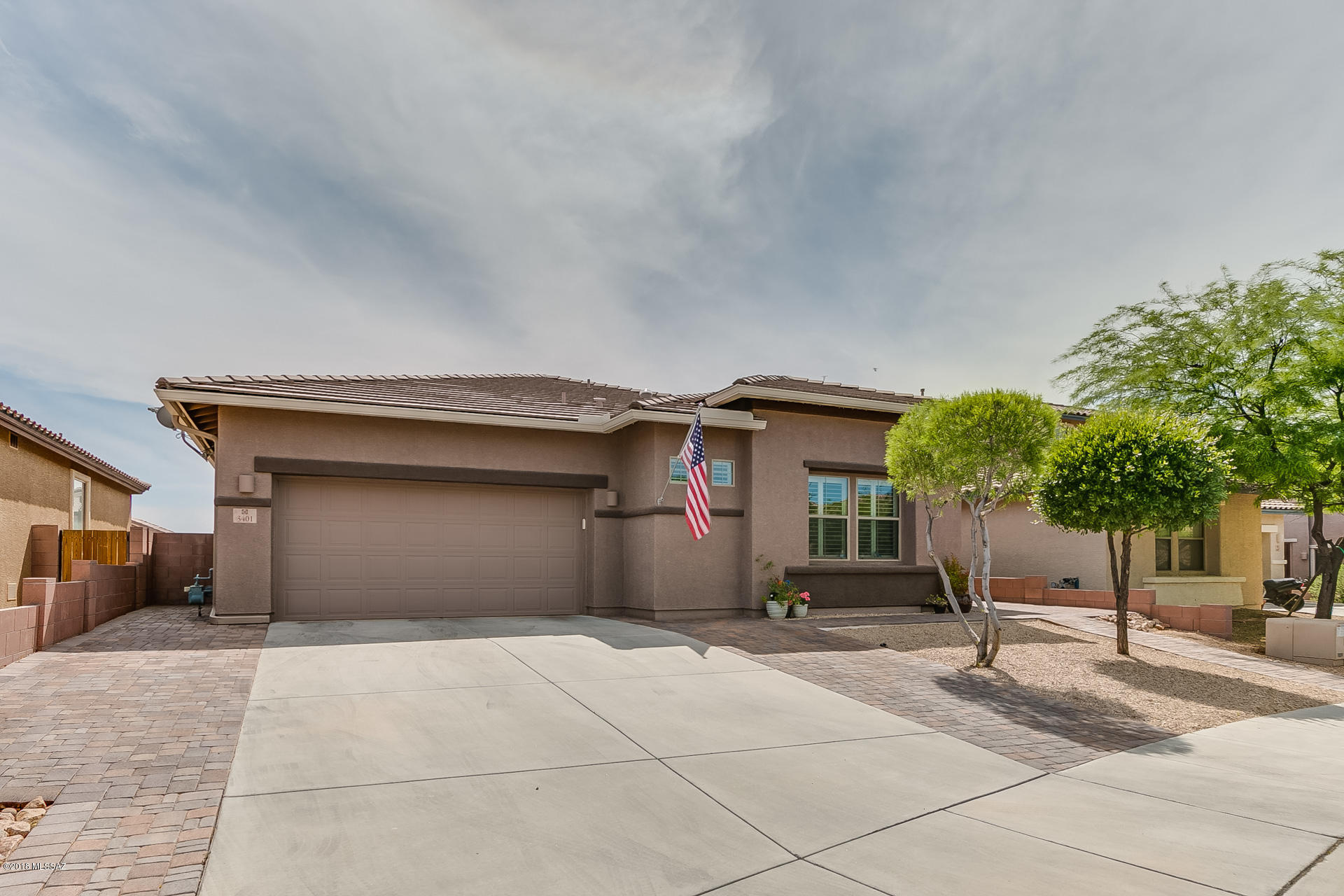 This Exceptional 1,950 sqft (4BD/3BA) home is located in the desirable gated community of Tangerine Crossing. Open modern split bedroom floor-plan. Owned solar panels for low monthly electric bills. Open concept chef's kitchen with SS appliances, granite counters, 5-top stove. Great room includes patio access. Huge private master suite with deluxe master bath and over-sized walk-in closet. Gorgeous bamboo flooring & 8' doors to all rooms. Outdoor living at its finest with covered/uncovered extended patio with pavers, beautiful landscaping, campfire fire pit & turf. This home is in immaculate condition and perfect for the most discerning buyer. A must see!