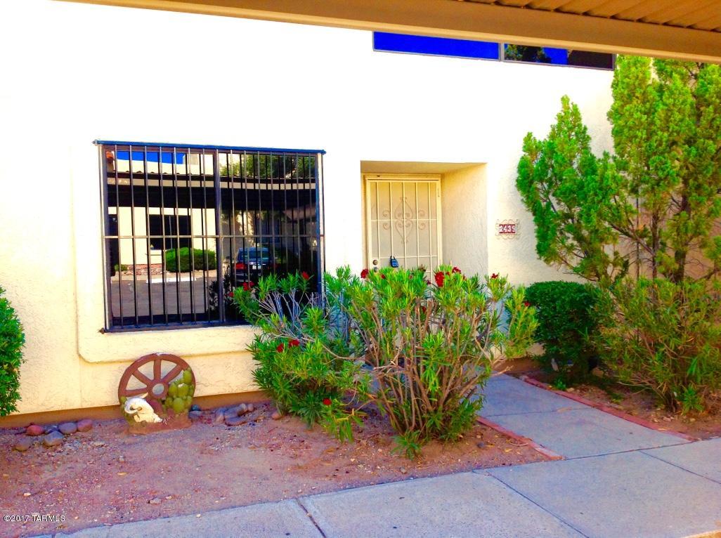 LOCATION, PRIVACY, SECURITY @ the peaceful, gated town home community of Ironwood Ridge. Community Pool and Spa. New AC, elastomeric roof coating and all appliances. Great west side location near shopping, restaurants, parks, hiking trails, transit, Pima College and St Mary's Hospital. Easy access to I-10, U of A and Downtown.  Two parking spaces one covered and one uncovered. Ideal covered patio, walled courtyard and second story sun deck for your outdoor enjoyment. HOA covers water, exterior structure, security, gated access, pool, spa and common areas.