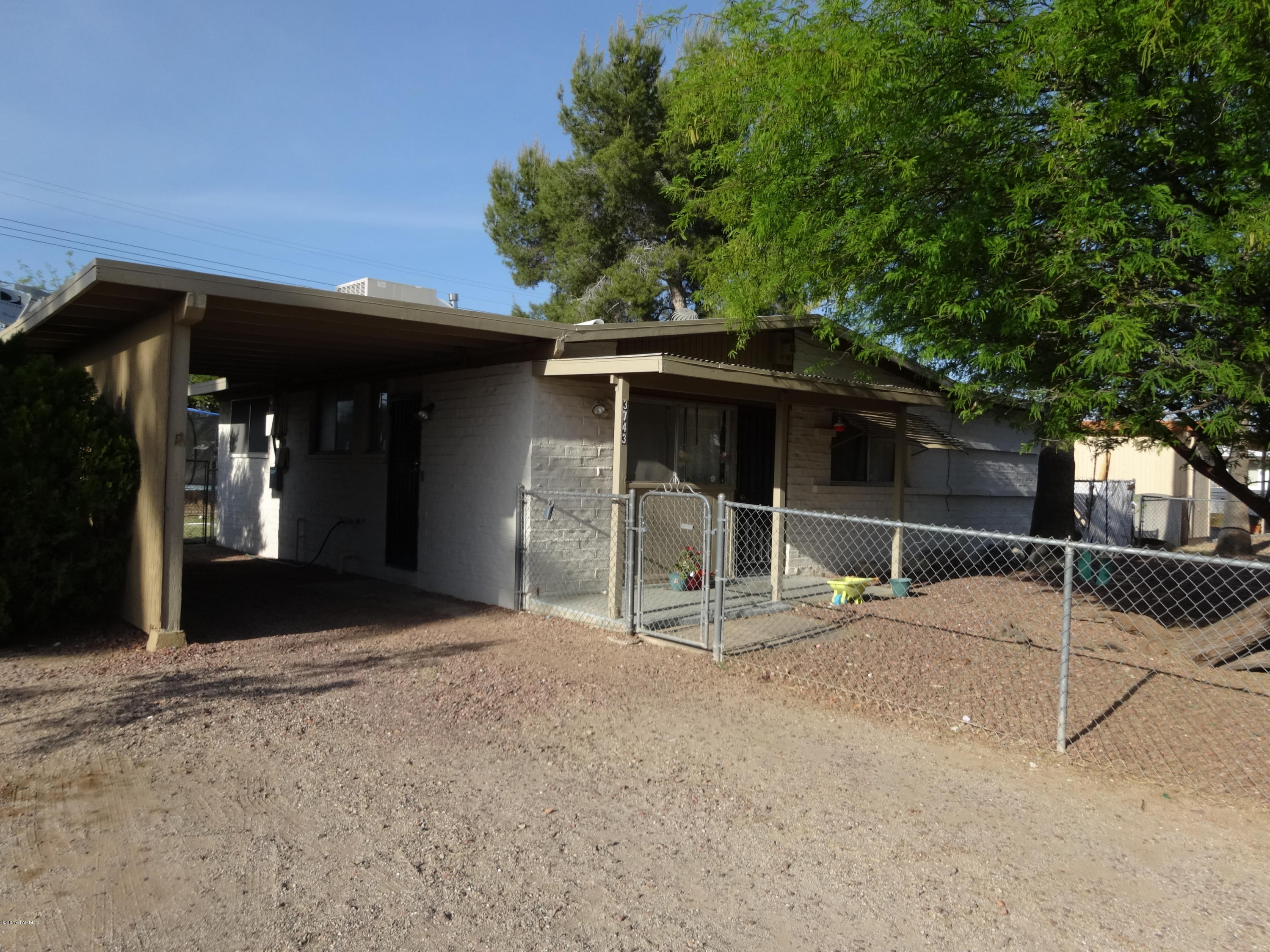Great central starter home.  Close to shopping, large lot with fenced front, side and back yards.  Third bedroom is currently used as living room with closet.  Newer heater and water heater. Upgraded flooring.  Kitchen cabinets recently refinished. Very cute comfortable home.  You will love it!