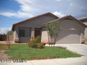 Beautiful home in Gladden Farms, this home has a great floor plan, new tile , refigerator, dishwasher, stove, open kitchen, private yard that backs up to walking path.