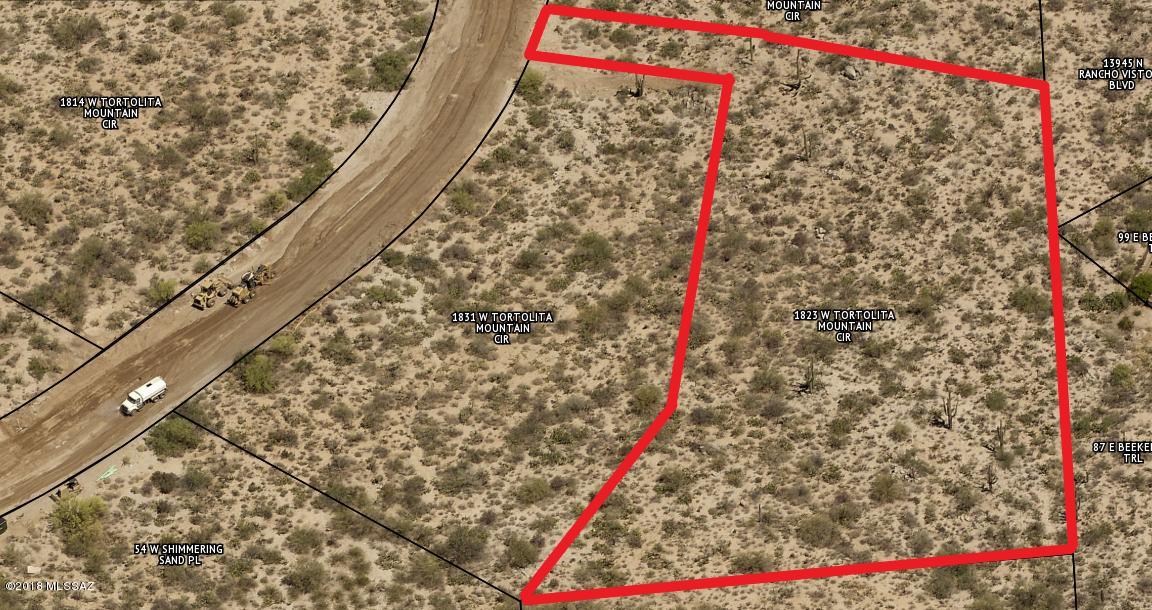 Remarkable Stone Canyon custom home site with Views of the Catalinas Stone Canyon is a private guarded gated community, that provided luxury living with our private club, Health and Fitness center, tennis courts, pools and restaurant and bar. Memebership is required.