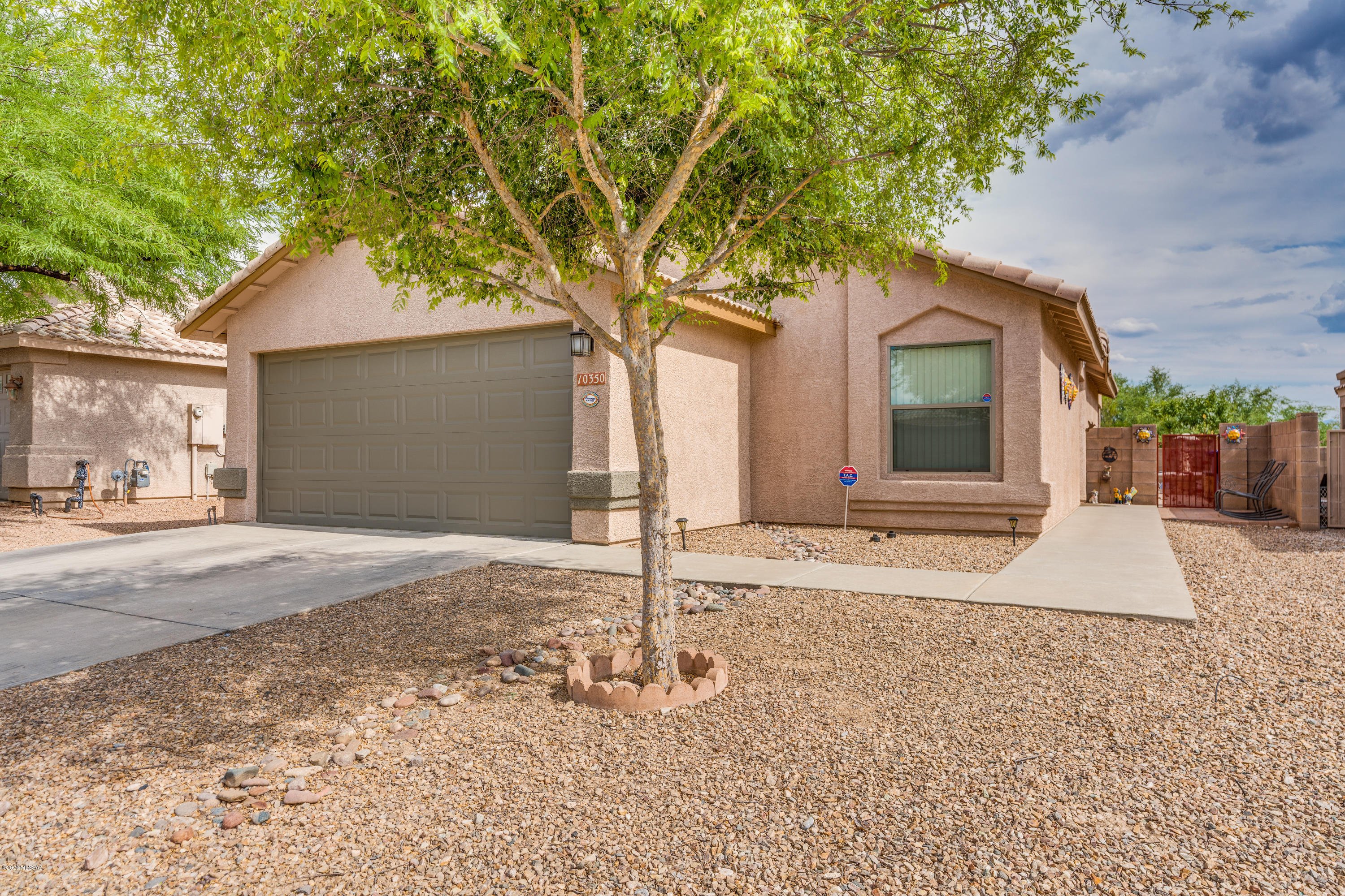 This well laid out 2 bedroom 2 full bath PLUS den has been meticulously maintained and is truly move-in ready! Fresh interior paint, new interior light fixtures, new kitchen faucet, new toilets & new smart garage door motor & opener are just a few added bonuses! SS appliances include a 5 burner gas range with grill attachment & top of the line dishwasher less than 1 yr. old. Large master suite w/ walk-in closet that has tons of custom shelving. Wood laminate in bedrooms and
ceramic everywhere else - NO CARPET! Enjoy amazing sunsets from your covered back patio in your huge backyard.