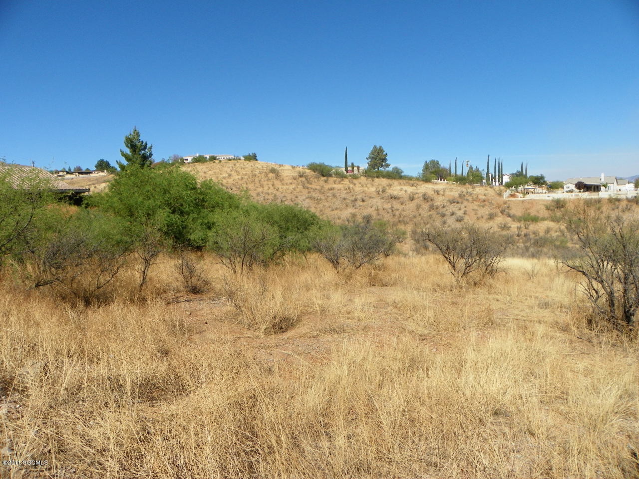 Nice lot on very popular Rio Rico Drive. Short hop to the interstate or store, golf course or fitness center. Electric and water at the street. Paved street.