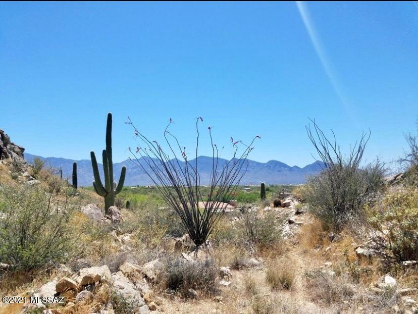 Set behind the gates of the prestigious, sought- after community of Stone Canyon.  This 1.11 acre lot offers you the privacy + views you've been looking for at a great value!   Perched high on the hill -this beautiful homesite looks out onto the Catalina Mtns towards the southeast and stunning views of the Tortolita Mtns to the North.  
The dramatic view of the surrounding scenic mountains is further enhanced by the array of luxurious opportunities offered at Stone Canyon.  Enjoy the acclaimed Jay Morrish-designed world-class golf course. Ranked in the top 100 golf courses in the nation according to Golf Digest. Plus, exclusive access to the Health and Fitness Club.  An upscale lifestyle and luxury comforts await you in Stone Canyon!