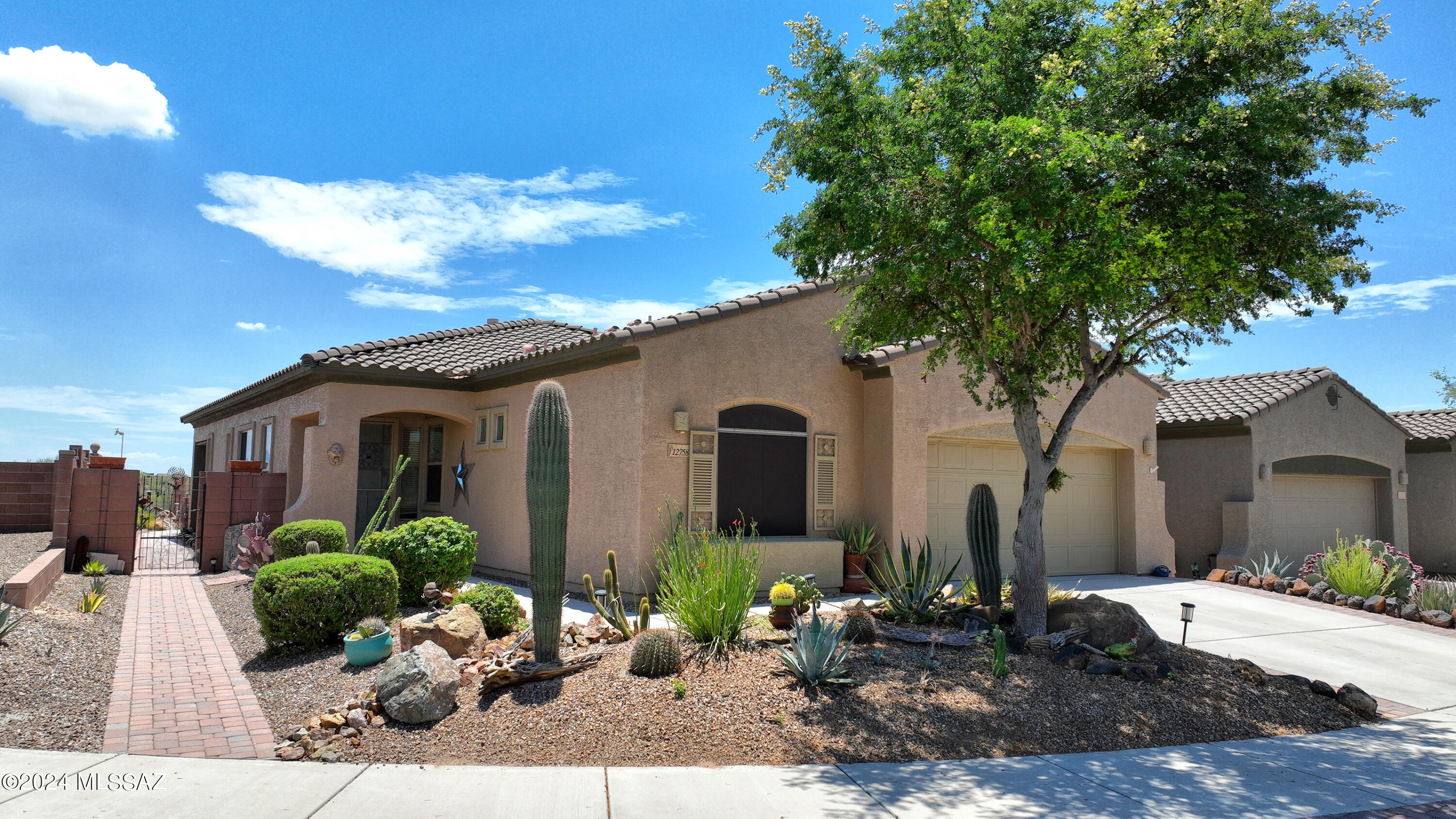 Breathtaking Views & Beautiful Home in Gated Community! Home well-appointed & sets at Cul-de-Sac. It has 4BR, open concept, Great Room w/gas fireplace, dining area off Great Room, Kitchen w/Granite Counters. Flex space room currently being used as a Coffee & Bar area (could be Formal 
Dining, sitting rm, den, etc). Great Rm w/ceramic tile, open concept & all windows have Top Down/Bottom Up Blinds. Mstr BR w/engineered wood floors & slider to back yard. Mstr Bath has an add'l mini-split heating/cooling unit & walk-in tile/glass shower w/dual sinks and Master Closet just off Mstr Bath. Other 3 BR have full closets. Full 2nd Bath has dual sinks and glass shower/tub.  Laundry Room has sink, cabinetry & Washer/Dryer stay. See Supplement for additional information. Supplement:
Water Softener is owned. There is a recirculating hot water system. Flagstone in the expansive back yard. 

Re the Master Bedroom Master Closet: This home was previously a rental in the Master Bedroom/Bath/Closet areas only. There is a lock on the sliding glass door for privacy and to give the previous renter access. The door to the Master from the main home was boarded up for renter privacy. 

The owner had put in the mini-split heating/cooling unit so the renter would have their own heating/cooling capability. 

The Master Closet was re-designed for a renter in usage only. There are 4 stand-alone closets in the Master. The owner also converted the other side of the closet with counter, built-in cabinetry, microwave, toaster oven and mini-refrigerator. Not knowing if a prospective Buyer(s) would be interested in this area for a "parent" area or "child" area, the Master Closet has not been 100% reverted to the original Master Closet. This will be negotiable with Seller/Buyer.