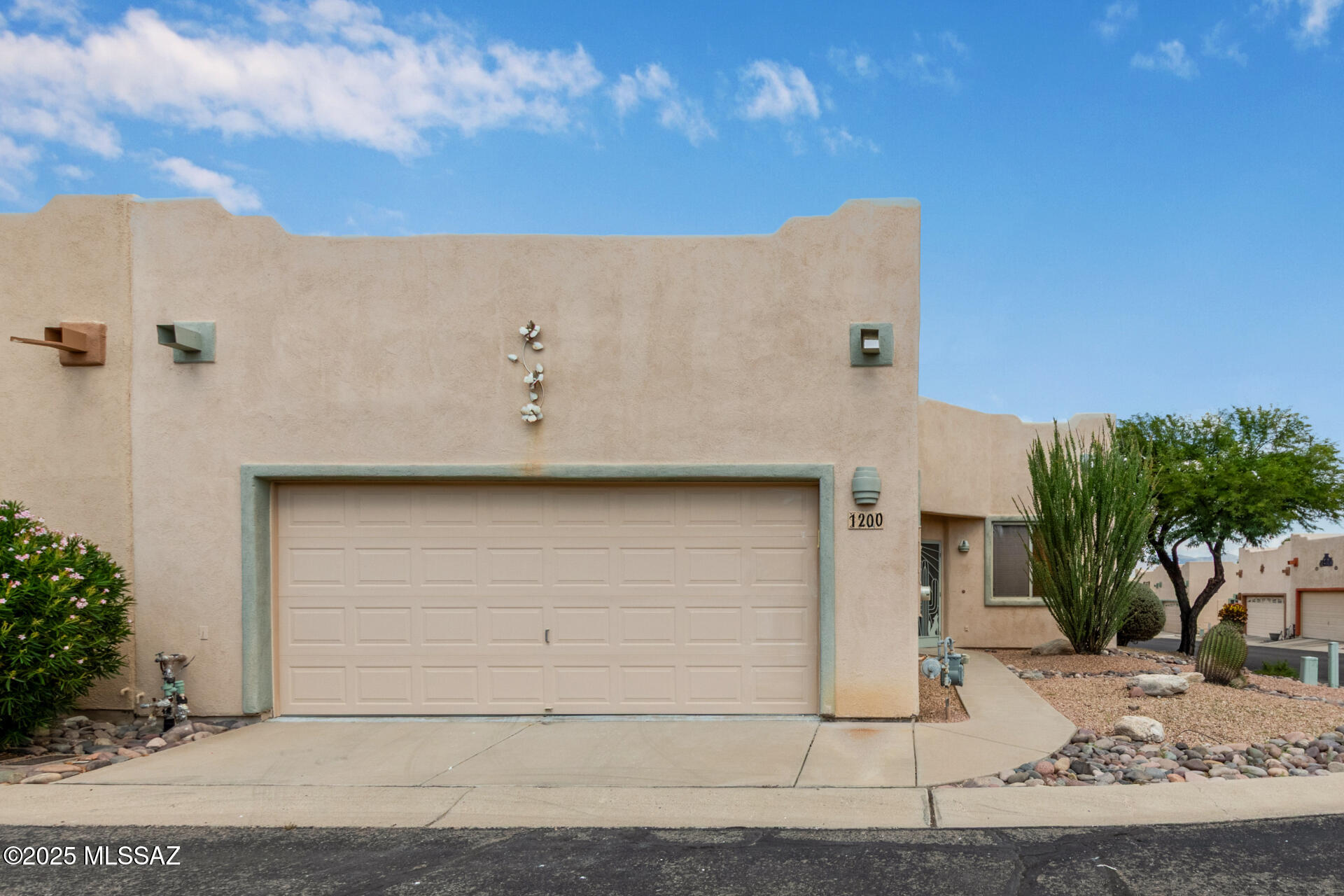 Welcome to Canyon View Estates and experience low-maintenance living in a prime location, just minutes from all essential amenities in Green Valley. This well-maintained 2-bedroom, 2-bathroom home in the 55+ community features a freshly rebuilt roof, a spacious two-car garage with plenty of storage, and a screened-in covered patio ideal for year-round enjoyment. Inside, the bright and open floorplan offers functional living space designed for comfort and convenience. Conveniently located near shopping, dining, golf courses, and medical facilities, with excellent community amenities included. This move-in ready, turnkey residence offers both comfort and convenience for your next chapter.