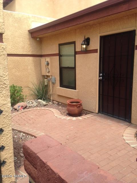 Great town home now available!!! 2 bedroom, 2 bath, plus a den. New tile throughout, updated paint, newer windows and A/C. Located in quiet complex with a great pool. Great location! Close to shopping, transportation and U of A!