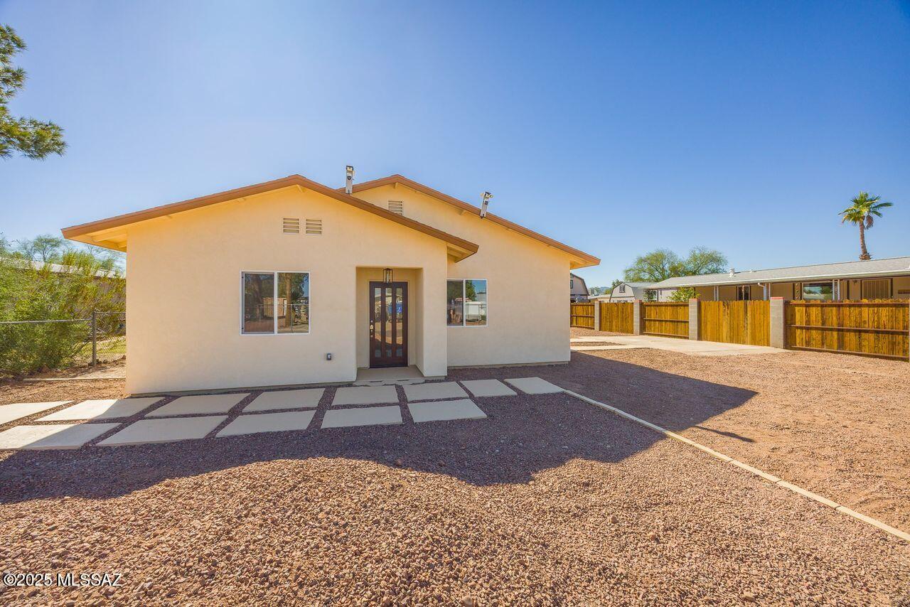 Sparkling NEW, light & bright, great room design offers - 3 roomy bedrooms plus laundry room. This home is on a great 71 x 115 ft fenced lot with plenty of room for an RV, boat, and more - double gate gives easy access. Home features ample cabinets, granite counters, and stainless appliances. Owners suite offers great space and bath has a walk-in shower. All flooring is vinyl plank or tile in neutral shades.