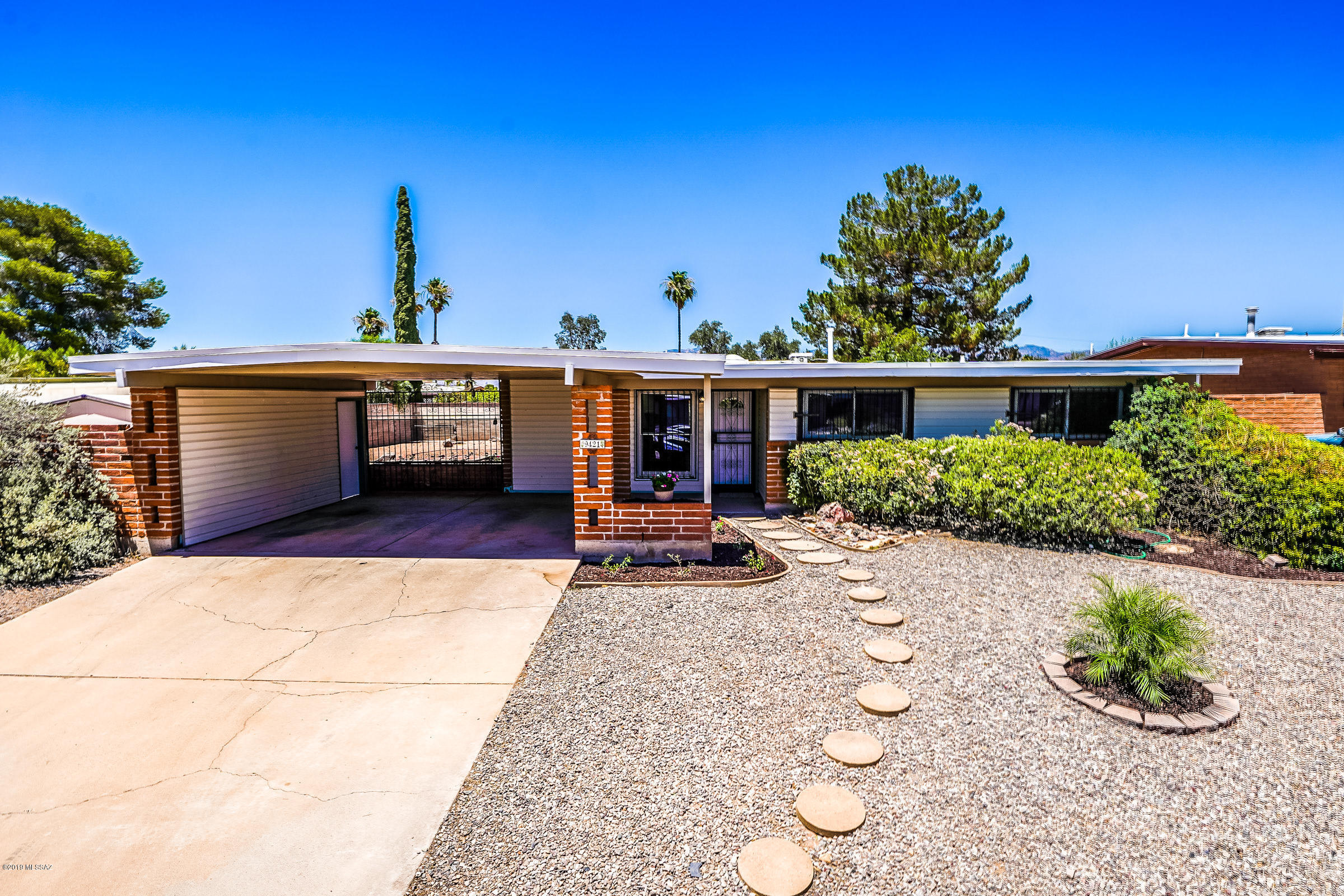 Range priced $210,000-$220,000 Don't miss this Rolling Hills beauty. Near perfect, move in ready and a gorgeous remodel. You will love the concrete floors, open kitchen with all new cabinets and granite counter tops. The character and charm have been left in but it feels like a new home. Dual pane windows, newer AC, updated bathrooms and mature landscaping. Wonderful low enrollment elementary  school walking distance from home. Close to shopping, gyms and restaurants. Seller is a licensed real estate agent in AZ.