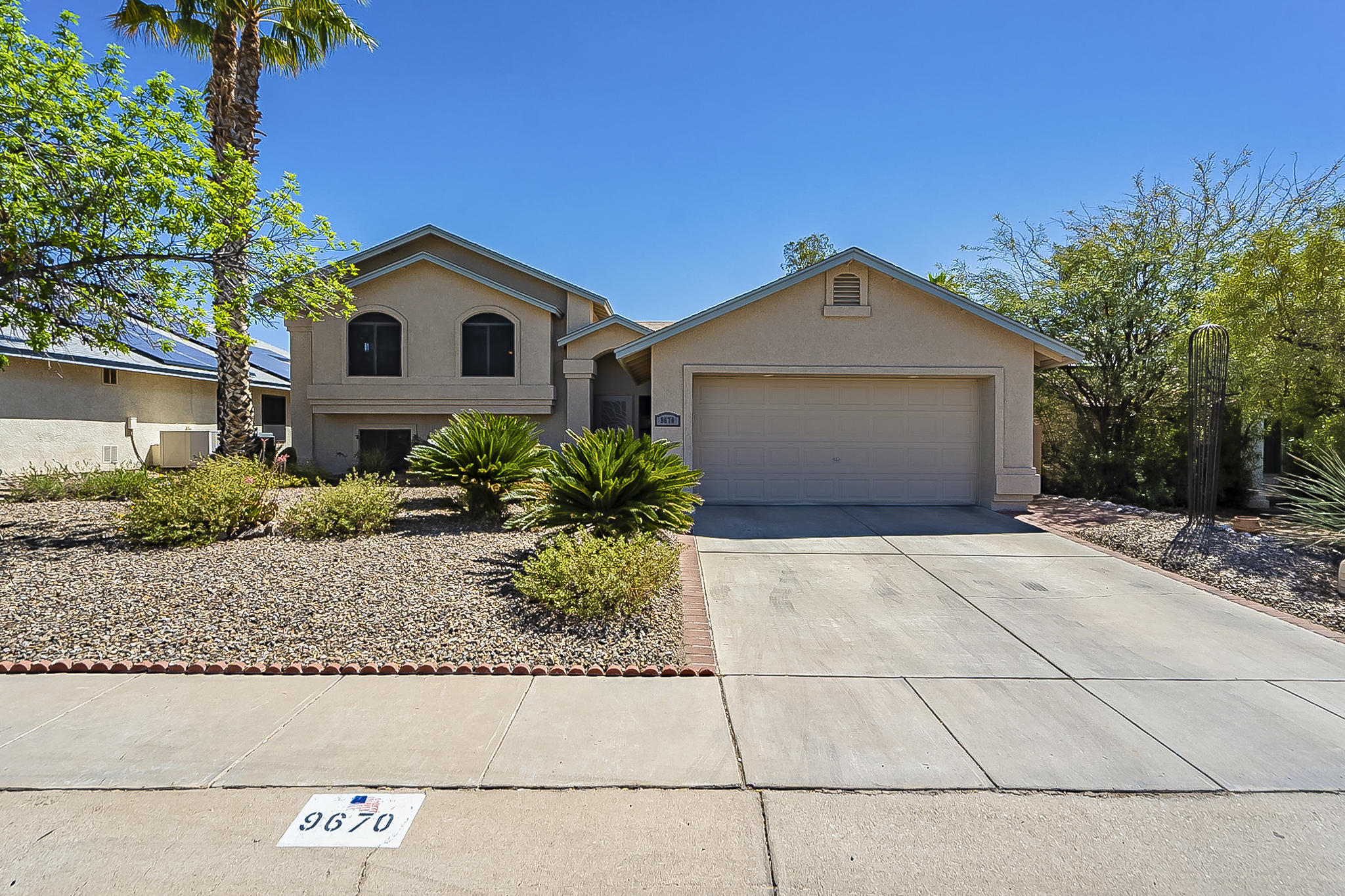 Wonderful, bright, welcoming, move-in ready 5 bedroom home with a sparkling pool!  This home has a terrific tri-level floor plan.  The lower level offers 2 bedrooms, 1 bath and huge bonus room; the main level includes the living, dining and kitchen areas; the upper level has 3 additional bedrooms (including the master) and 2 baths. Perfect for families, multi-generational living or working from home. Outdoors there are beautiful mature plants, citrus trees and an herb garden that have been lovingly cared for. There is no HOA. This location is very convenient. Within 10 minutes, there are highly rated schools, grocery shopping, retail, malls, restaurants, a library, multiple golf courses and parks. Interstate access is easy for commuting or going downtown. An absolute gem!