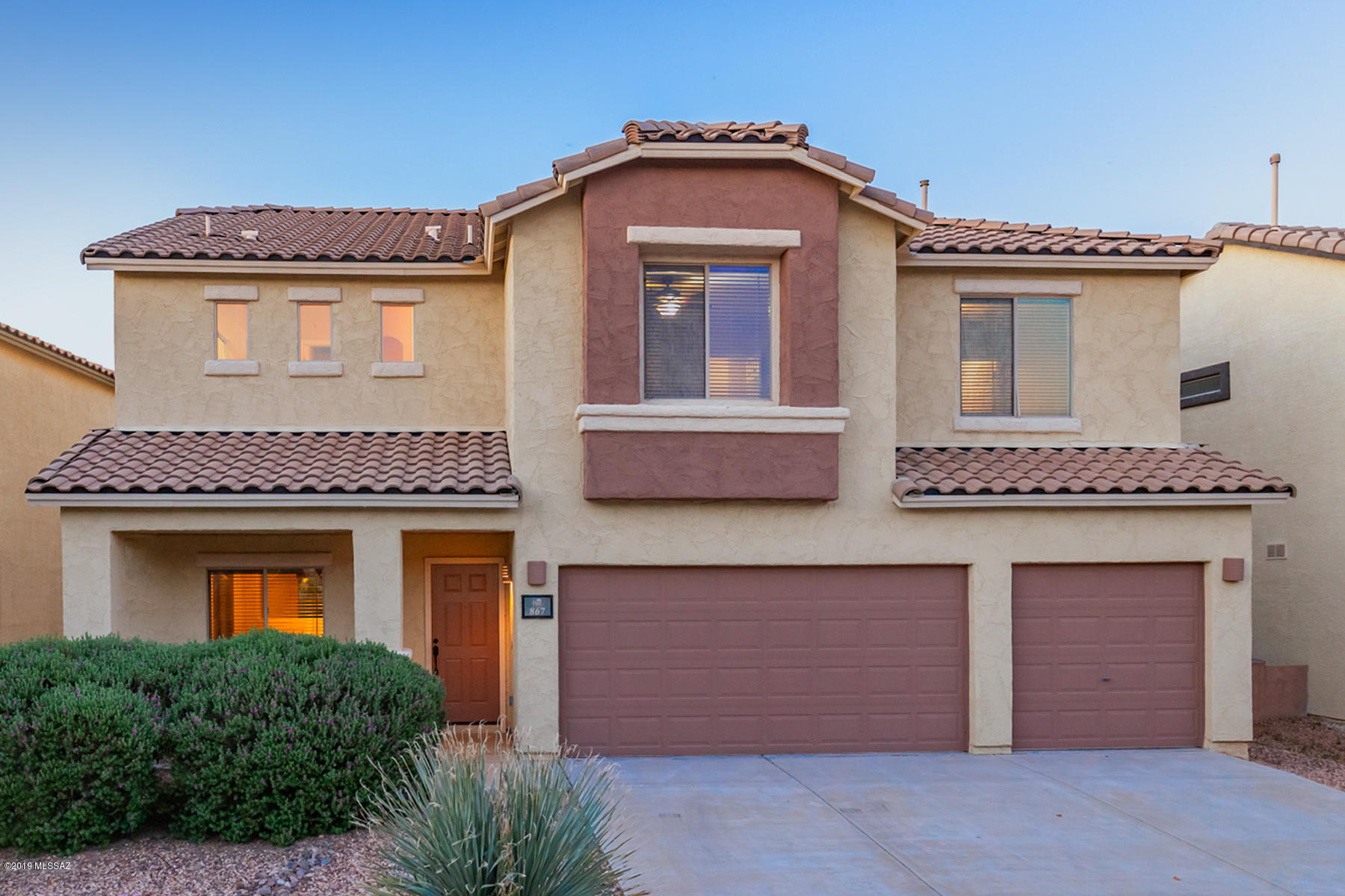 You won't want to miss this sharp 4-bdrm home in the desirable Rancho Sahuarita. Some of the great amenities of this spacious (3.070') 4 bdrm 3 ba. home include: Spacious living rm, fam rm, a great kitchen w/lots of cabinet & counter (Corian) space & stainless steel appliances, big & bright loft, & huge master bdrm. In addition all the bdrms have walk-in closets including the bdrm on the 1st floor, the interior has just been freshly painted in decorator colors & the entire 1st floor has attractive ceramic tile flooring. Some other great features include a fully landscape back yard with big porch & an extended flag stone patio, and a 3 car garage. Rancho Sahuarita is located in the Sahuarita School Dist, and offers community pools, lake, rec centers, and EZ access to I-19 and shopping.