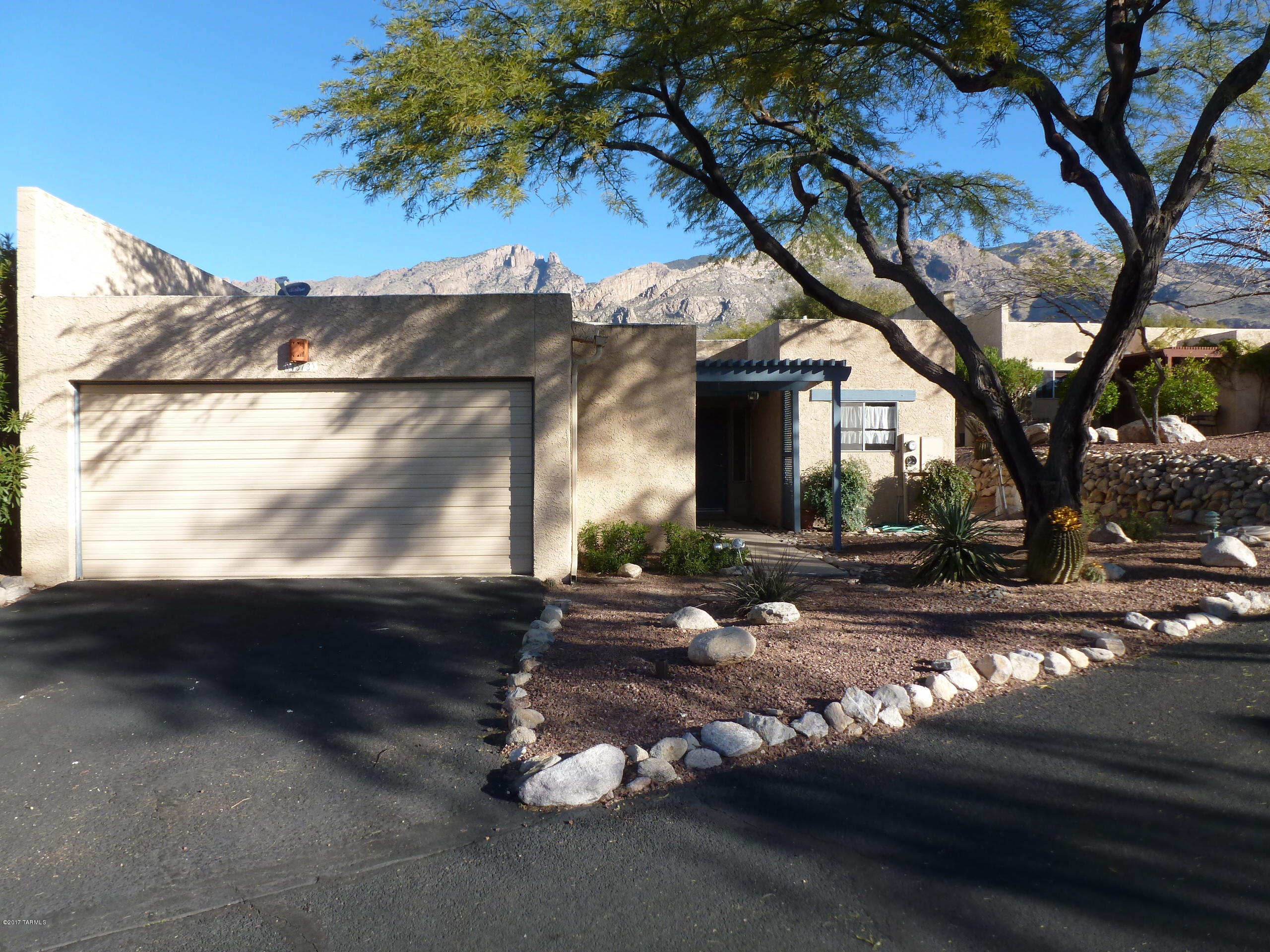 A gem in the desert, this 2 bedroom, 2 bath plus den is located in desirable Viewpoint 3 in the heart of the Catalina foothills.  Featuring great mountain views, covered patio, and a very private backyard for enjoying great outdoor living. The master suite has a walk in closet and large private bathroom.  Two Car garage, storage room, Washer/Dryer, community pool,  great location near shopping, dining, and entertainment.