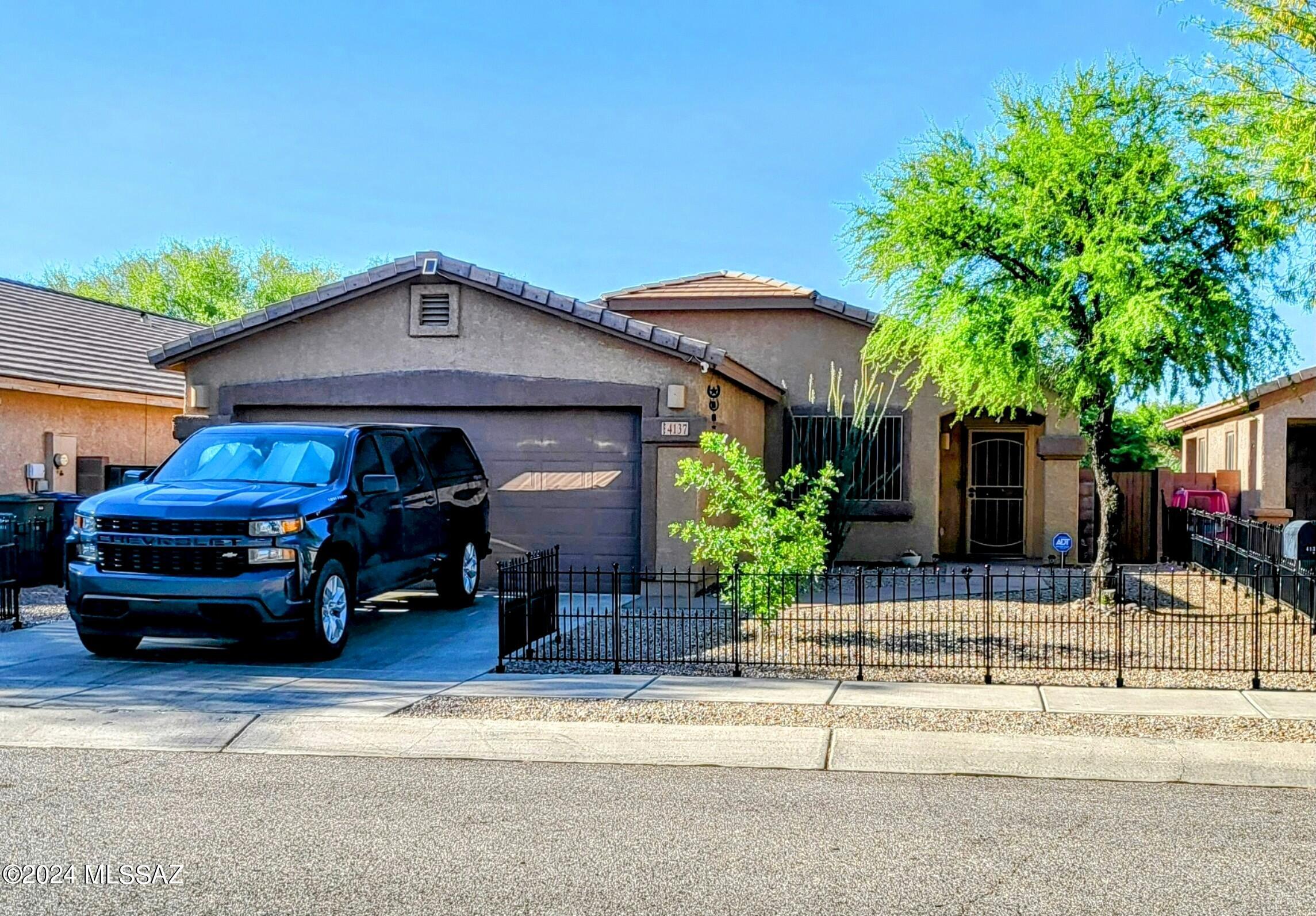 Price reduced to sell. Don't let this one pass you by. Turn key Lennar 3 bedroom 2 bath single story home. Enjoy the sunsets relaxing in the beautifully low-care landscaped backyard.  Large master bedroom with a walk-in closet and a gorgeous barn door to the master bath, which has a shower and large tub combo and double sinks. Home has ceiling fans in every room, ADT Alarm system, wrought iron doors and wrought iron on windows, home energy saving solar panels, new water heater and the outside of the home painted in 2022. All appliances in home are included, refrigerator, electric stove, washer and dryer! Also comes with termite warranty through February 2025.