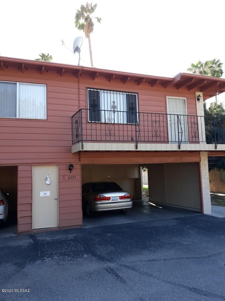 Desirable NE Location- This unit looks AMAZING. It features freshly painted kitchen and bath cabinets, granite countertops, freshly painted interior walls and ceilings, newer carpet, undated plumbing fixtures and a newer patio deck. This is a popular neighborhood with 2 pools, wide open spaces, and beautiful landscaping, Conveniently located near restaurants, shopping , entertainment. Convenient to the U of A. Unit has one carport space, along with additional storage. Each building has 4 units with its own coin-operated laundry room. Included in the rent is water, sewer, gas, trash and  pest control. Renters insurance will be required.  Application Fee is required.  Apply at SNLRealtyandRentals.com