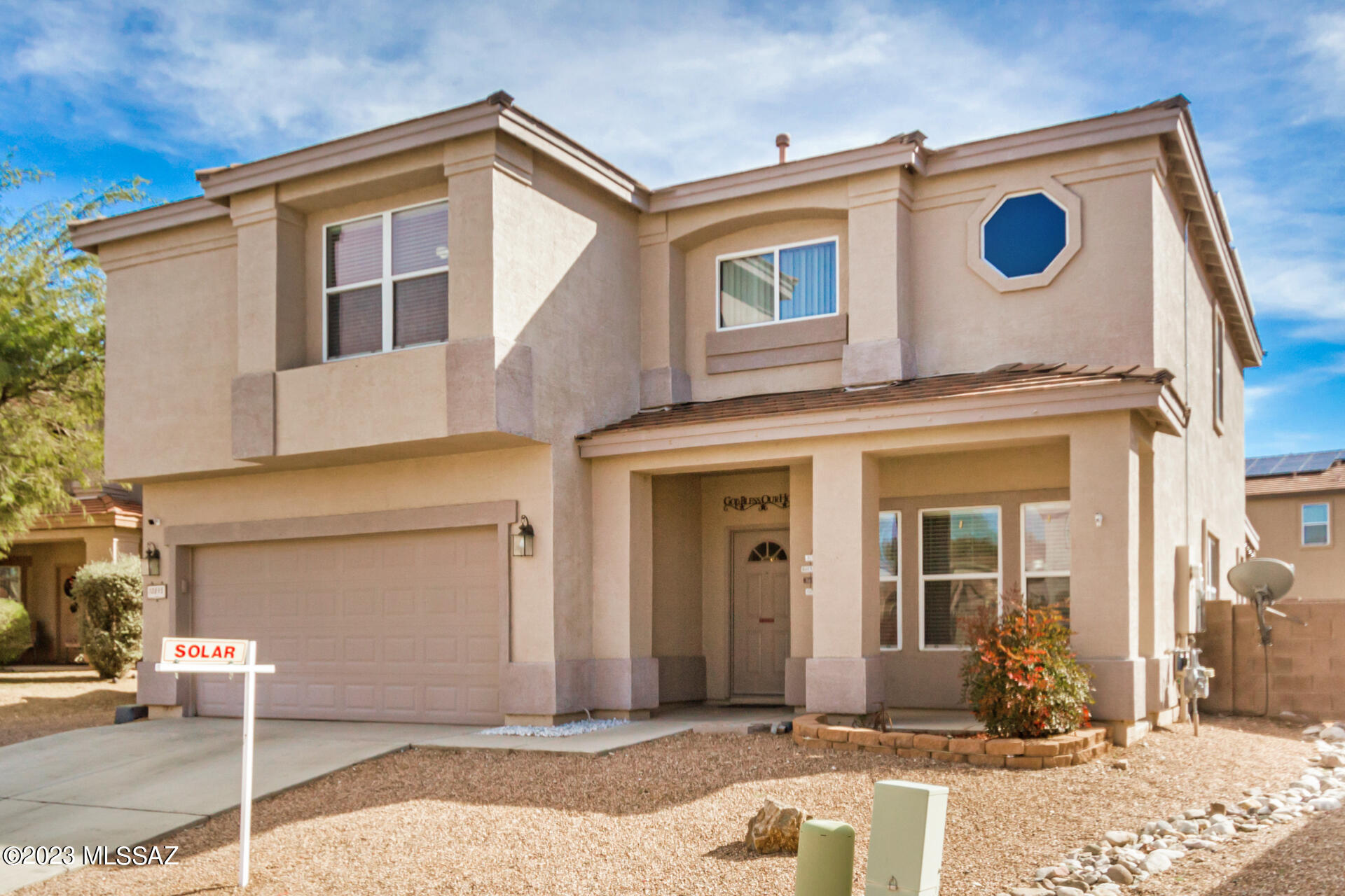 WELCOME TO BEAUTIFUL RANCHO DEL LAGO COMMUNITY! This beautiful home has it all, starting with a BRAND NEW OWNED SOLAR SYSTEM & Security system! Living Room/Dining Room, and large Family Room w/guest powder room downstairs. Kitchen features breakfast nook, Corian counters, gas range, included SS fridge & appliances. Great sized Laundry Room has ample storage & counter space includes washer/dryer. 4 large bedrooms upstairs with 2 full bathrooms and a huge versatile loft. Full length covered patio; pool-sized backyard ready for your custom dream oasis! Storage shed, RV Gates, Soft water loop and Garage has tons of shelving for storage, Vail School District, quick access to I-10, easy commute to Raytheon, UA Tech Park, DMAFB. Come make this your new Home Sweet Home!