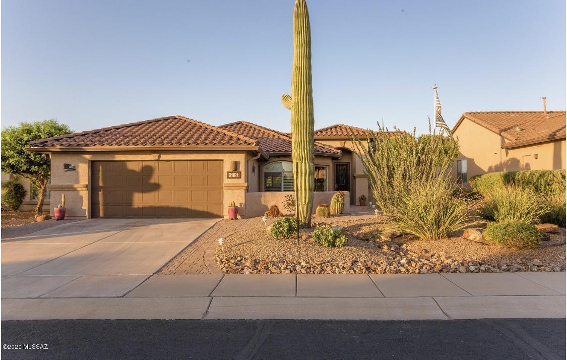 Quail Creek gem! This lovely 2/2 home with opt 3rd/den which has built-in Murphy bed & desk for plenty of space for work & guests. Open concept floorplan with large eat-in breakfast nook, laundry room cabinets, walk-in master closet, 4-ft garage extension allows space for golf cart, & bay windows that contribute to a light & airy home. Custom wood shutters & Hunter Douglas shades throughout. Plank-style tile in living spaces & rooms- no carpet! This pristine lot provides a backyard desert oasis with built-in gas bbq, custom pavers, and extended covered patio to enjoy your natural reserve views. New roof, new water heater & interior paint 2020, new water softener 2019, new garage door opener & appliances 2018. Come make this house your home and enjoy all this 55+ community has to offer.