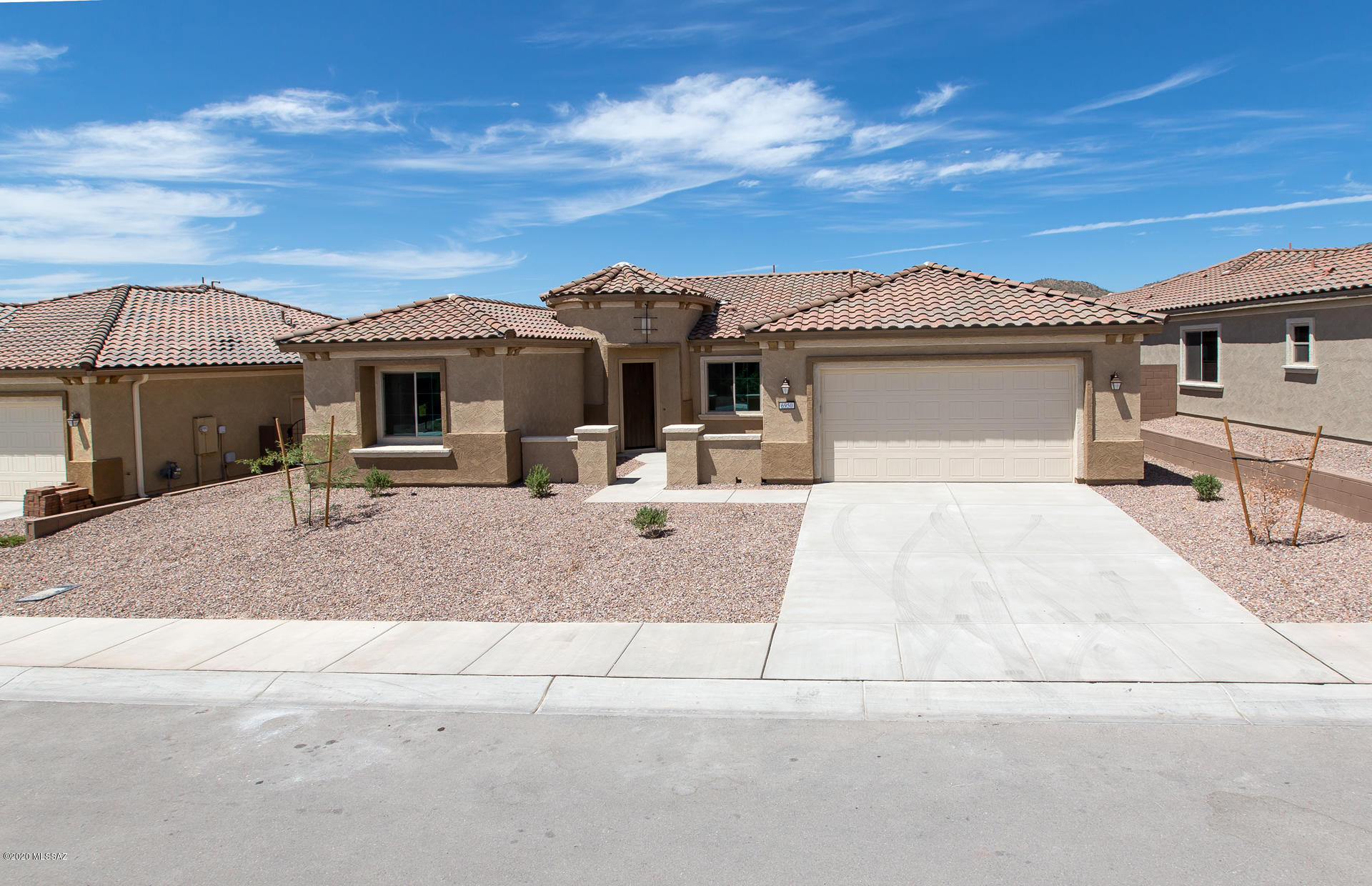 Available June 2020 see this Serenity with open floor plan located on desirable private lot with open space behind to enjoy the beautiful scenery.  Home has 2 master suites, amazing framed walk in shower in owner's suite, Kitchen Air built in appliances, Kitchen Aid fridge, highly upgraded kitchen, and courtyard wall in front of home.  Other upgrades include wide walkway to front door, great room with built in AV, den with French doors, gas stub and outlet package, main line to backyard, soft water plumbing loop and sink pre plumb in garage.