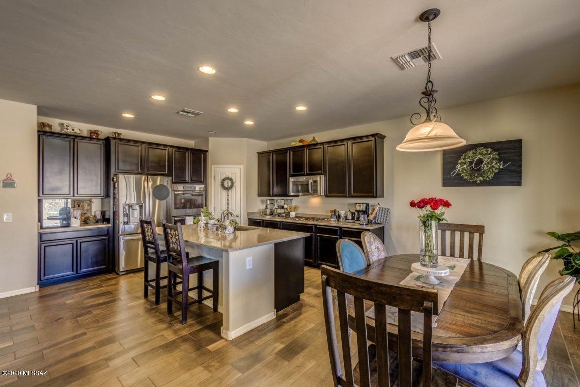 Seller accepting offers between $275,000 - $285,000. CHECK OUT OUR NEW VIRTUAL TOUR!! Beautiful home in desirable San Lucas neighborhood. Inside the open floor plan, features include granite counter tops in the kitchen with stainless steel appliances, double oven and gas range. 3 bedrooms plus a den. Master bedroom has a walk-in closet and dual vanity sinks with matching cabinets throughout. This home has tile in all the right places, carpet in the bedrooms. Walk outside to your extended patio and built in BBQ.  Plenty of room for entertaining, with space for garden or dog run. Don't miss out on this one! Come see today!