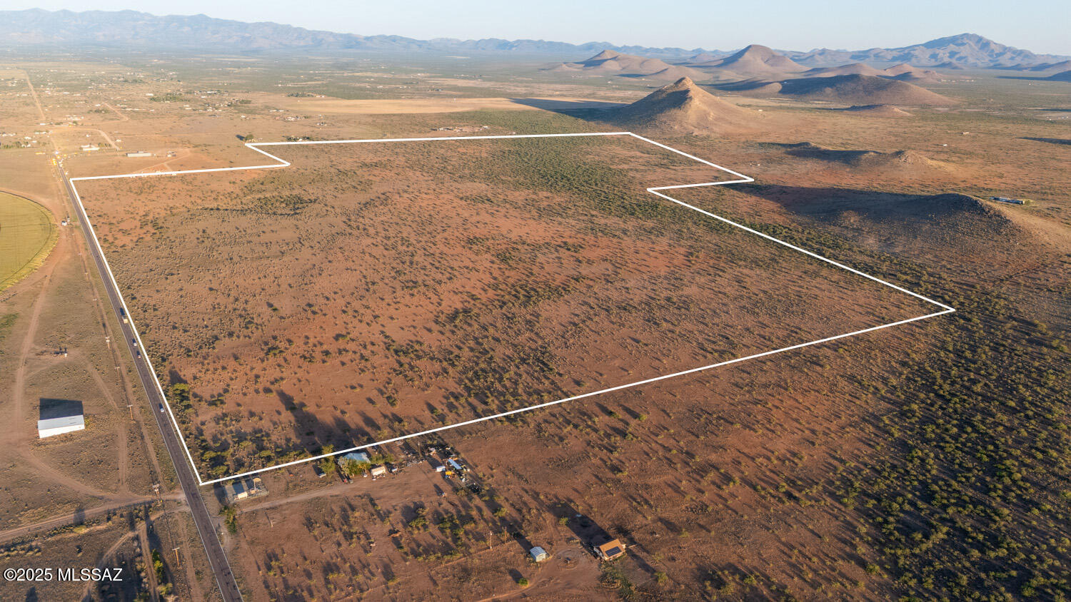 This nearly 400-acre parcel offers breathtaking mountain views, rolling grasslands, and endless possibilities! Located in one of the most beautiful areas of the valley, it's perfect for a horse property, homestead, ranch, or investment. Enjoy dark night skies, abundant wildlife, and nearly a mile of paved frontage. The property features two wells, including one an impressive 960 feet deep, plus power at the property lines. Partially fenced and ready for livestock, it can be purchased as a whole or in smaller parcels—seller is willing to split and finance! Whether you're looking to build, invest, or expand your agricultural dreams, this is an opportunity you don't want to miss. Call today to explore the possibilities!