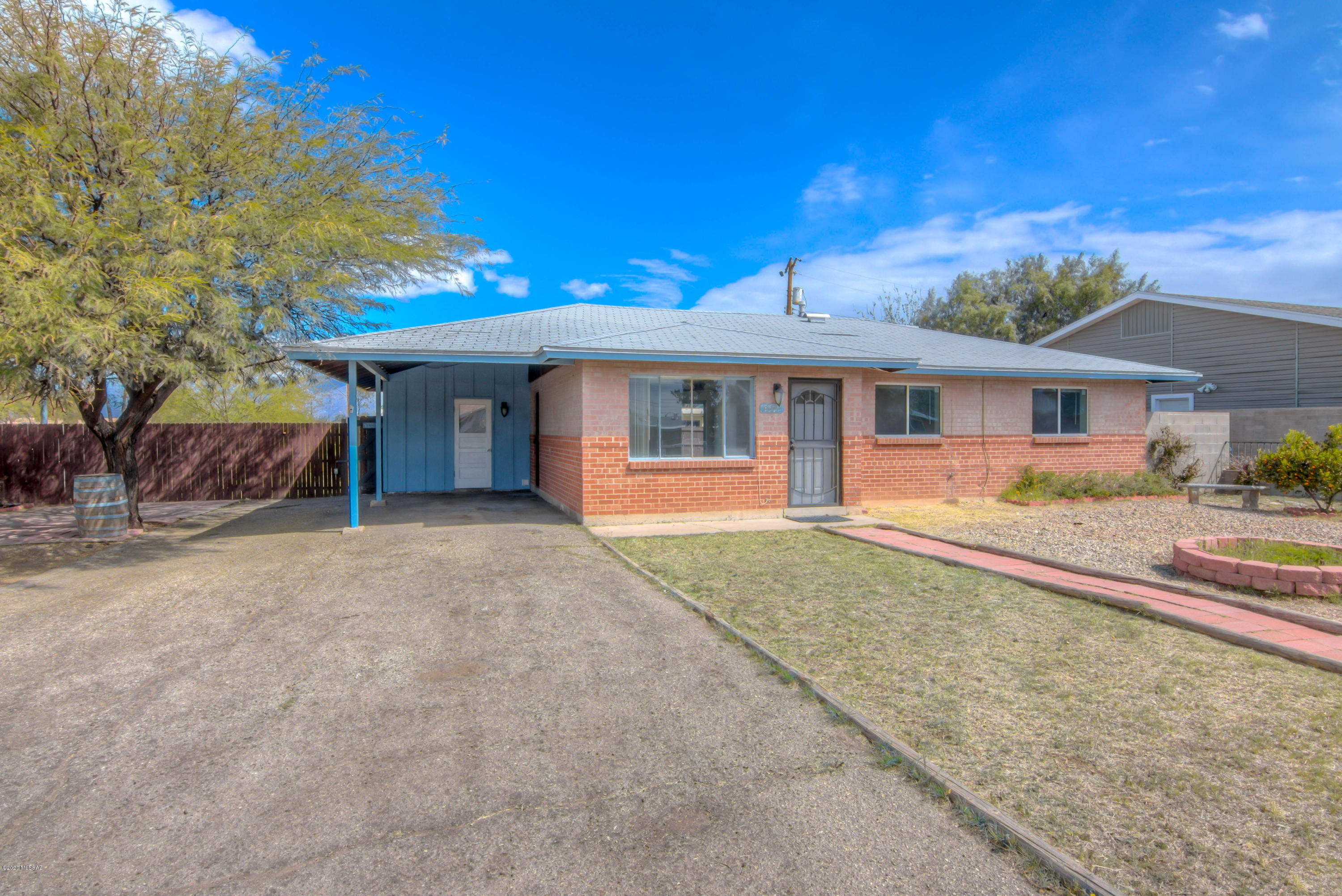 This 3 bedroom 2 bath home is move in ready, and a great price in today's market.  Great for owner occupied OR rental property. Large yards, updated bathrooms and fresh paint throughout. Close to bus lines, entertainment, shopping, schools, you name it.  Carport and storage and plenty of parking. NO HOA.  Home has highly desired North/South exposure. Neighborhood pool available with optional membership. Hurry!