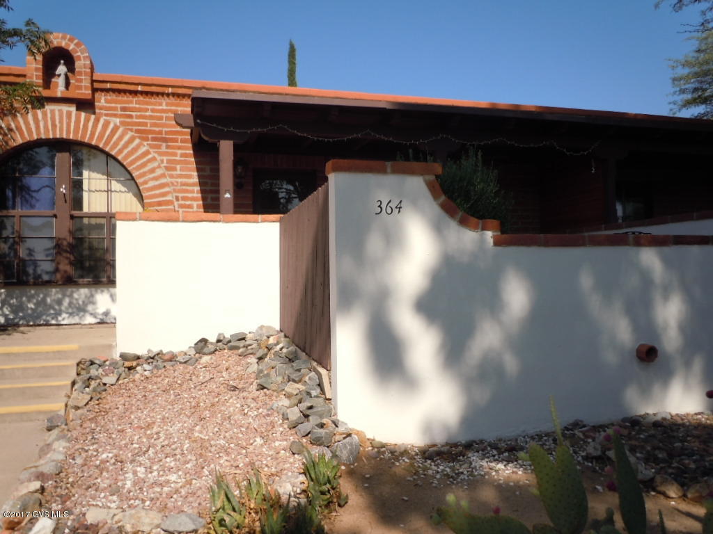 VERY PRIVATE SETTING. EAST FACING PATIO LOOKS OVER GREEN BELT WITH PEEK-A-BOO MOUNTAIN VIEWS. CONVENIENT PARKING IN BACK CLOSE TO BACK DOOR. MANY AMENITIES IN THIS NICELY FURNISHED VILLA BY SBOS. WASHER DRYER, DISHWASHER, CUSTOM BUILT-INS IN BEDROOM PROVIDES LOT OF STORAGE. EASY LIVING IN THIS GREAT NEIGHBORHOOD. H.O.A. COVERS ROOF, WATER HEATER, HEATING AND AIR CONDITIONER, PEST CONTROL, TERMITE, 2 POOLS TO ENJOY ALL YEAR AROUND, PUTTING GREEN, LAUNDRY FACILITIES. A MUST SEE. NO G.V.R., BUT AVAILABLE.