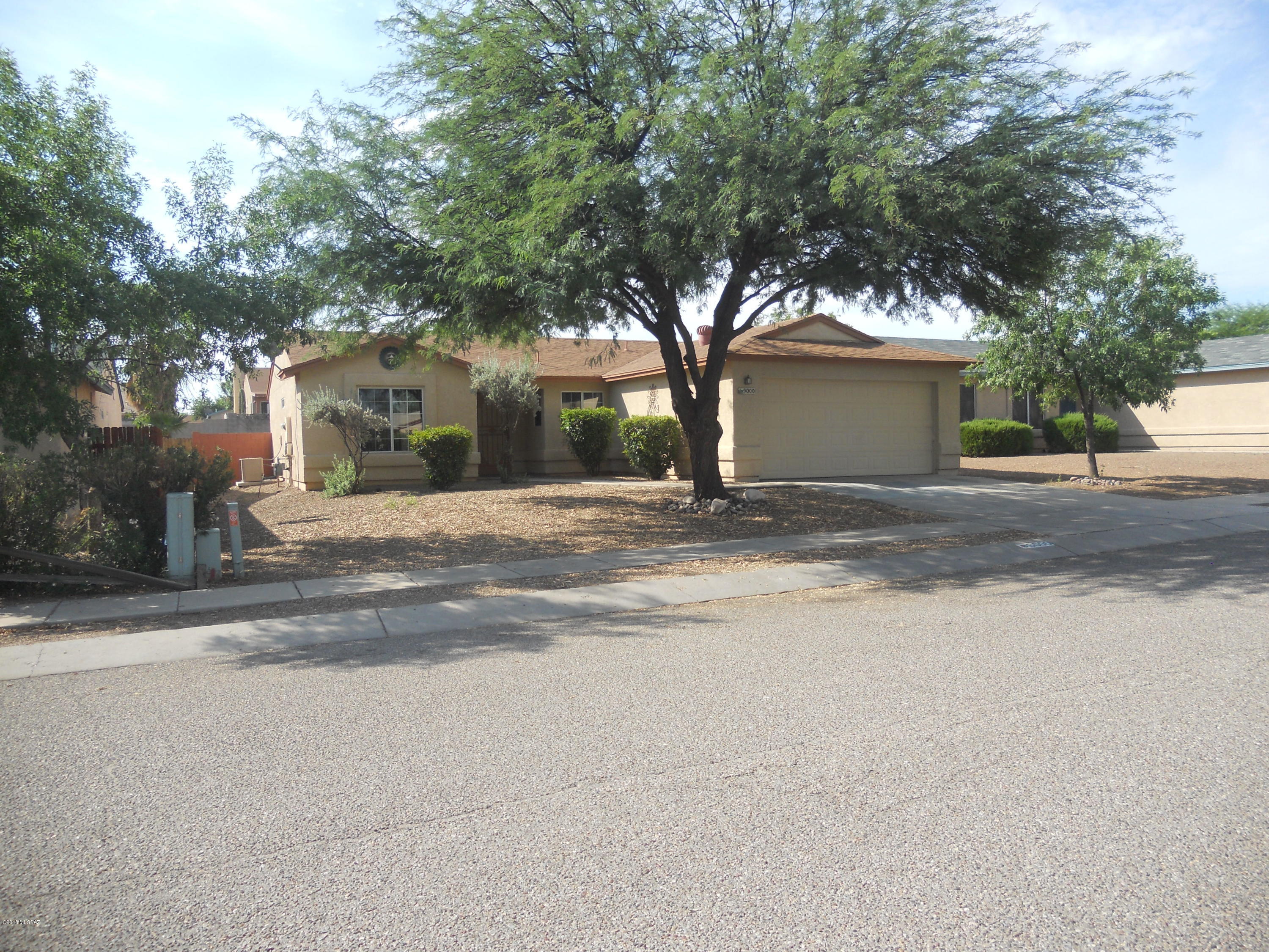 Exceptionally clean eastside 3 bedroom 2 full bathrooms, 2 car garage and low maintenance front and back yards. Block fenced back yard, new black appliances, tiled kitchen and bathroom counter tops, shiny easy to maintain concrete floors. High ceilings with fans in every room, new air conditioning to keep you cool in the summer and warm in the winter months.  Owner/Agent Call 520-237-5222.