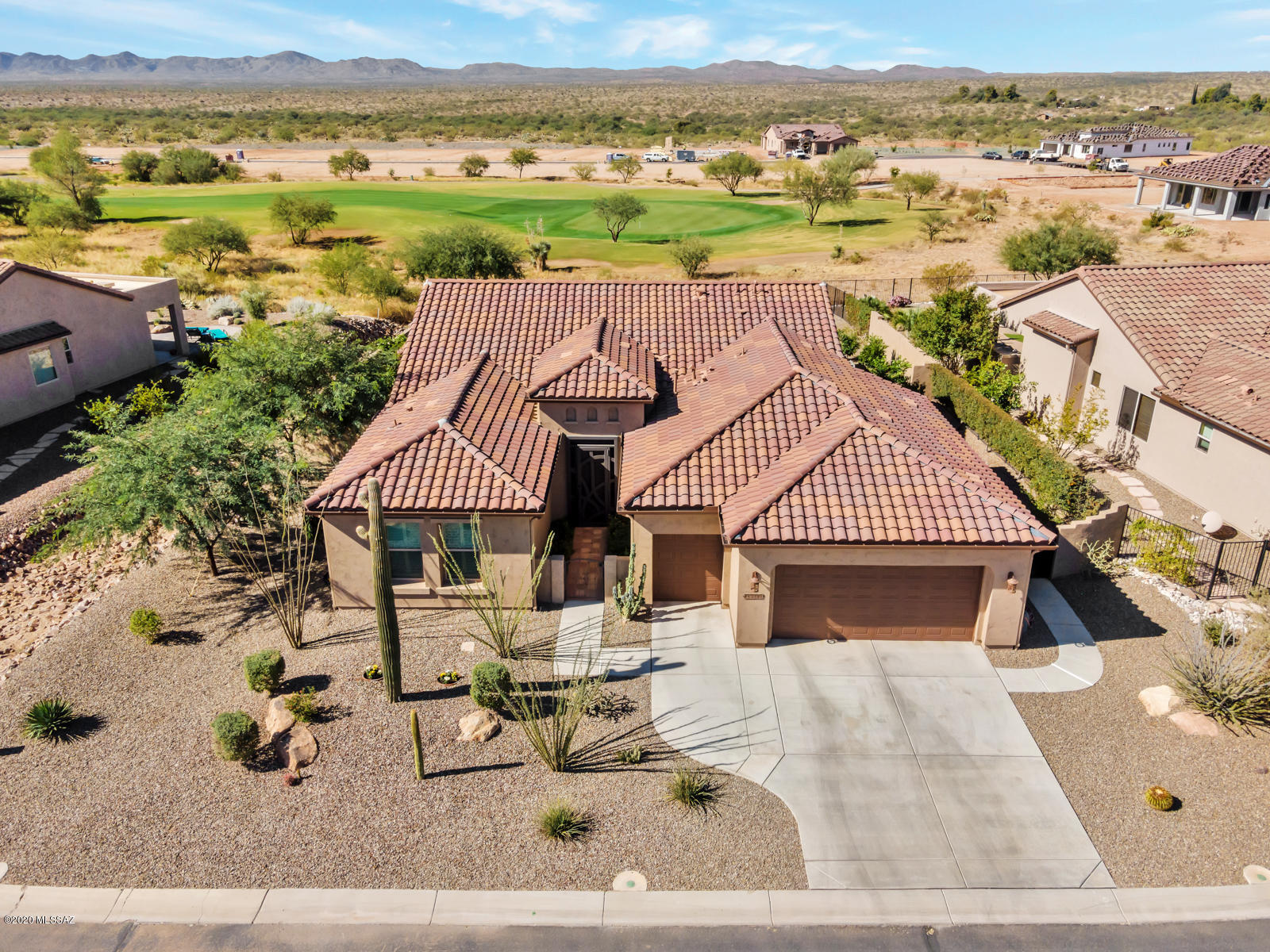Everything one could want in a retirement community. World class facilities include golf, tennis, multiple pools, spa & classes.  2 ensuite bedrooms & den with Murphy bed and closets in this stunning Cortez 2096 sq ft model located on the 15th green. Beautifully appointed with plantation shutters, Red Oak flooring, LUX 42 Heat Glo gas fireplace, GE Profile appliances and granite throughout. Extended outdoor living in the tiled & screened porch offering views of the Tortolita Mountains, golf course, pool & sunsets. Backyard oasis with 2 natural gas firepits, 2 gas connections & gas heated negative edge pool. No expense or quality spared in this design. Luxury living with the ease of 'turn key' vacationing. EZ to see! Not to be missed...Beautiful property offering hours of carefree enjoyment
