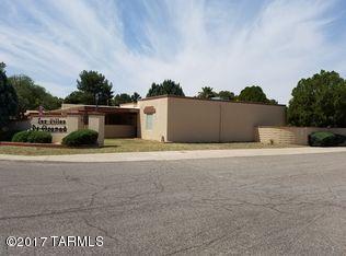 Wonderful & Beautifully unique,charming 55+ community town home - 2 bedroom/2 bath with den/hobby room/bonus room, close to everything with beautiful back yard and patio with mountain views. 2 car covered parking as well! Solid wood built-in cabinetry, pergo-type durable wood flooring and ceramic tile. HUGE Bedrooms with walls of closet space.  ''Green'' foam roof. Premium corner lot too. Must see this one! Call co-listing agent to see or to make offer