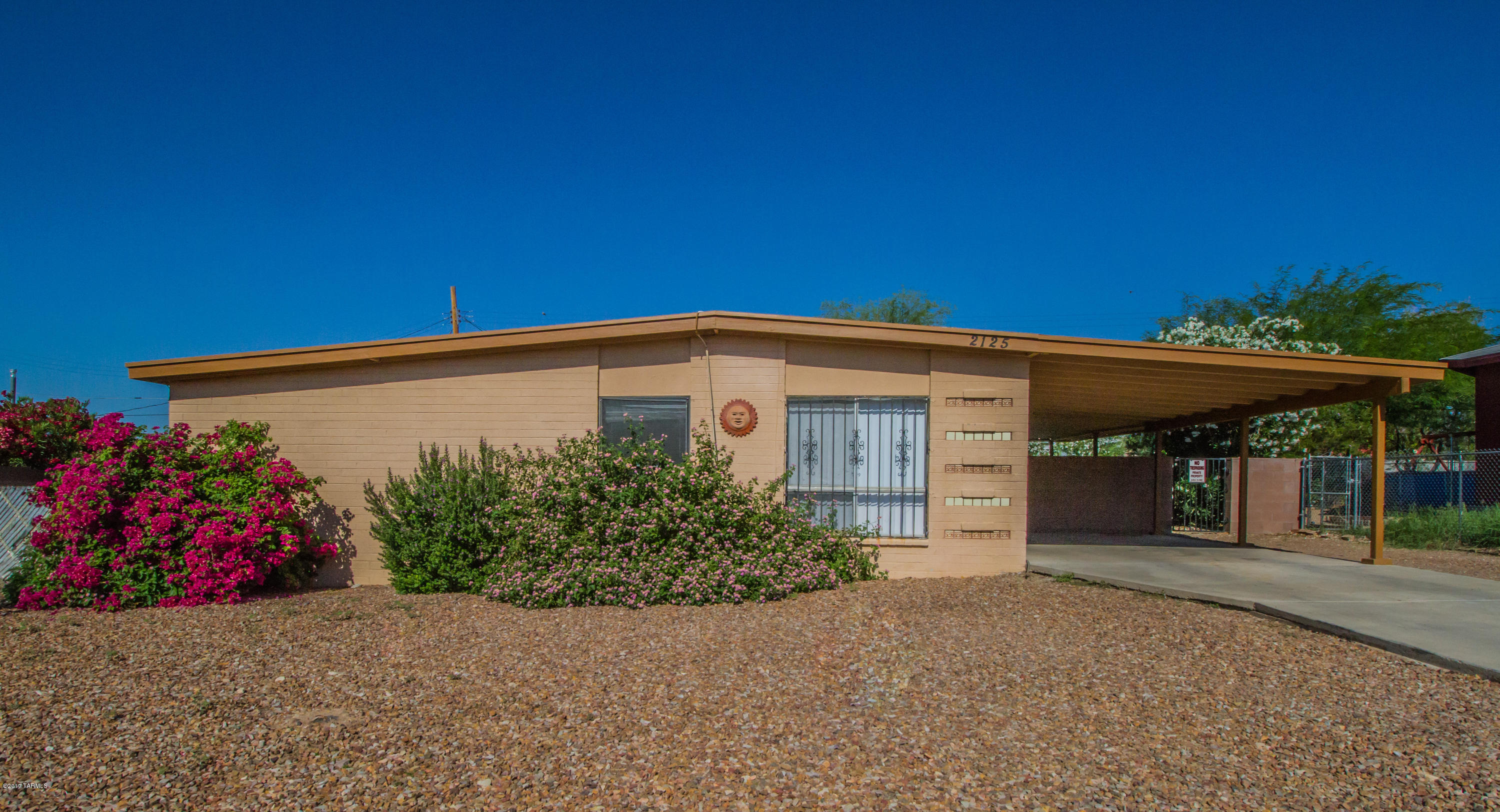 Super nice 4bd/2bth slump block house with a large yard & fenced pool. Just freshly painted! Tile in all wet areas and brand new carpeting in living room and bedrooms. Located less than 1 mile to the U of A. The best part, the pool is 100% maintained! All you have to do is enjoy it! Come take a look!