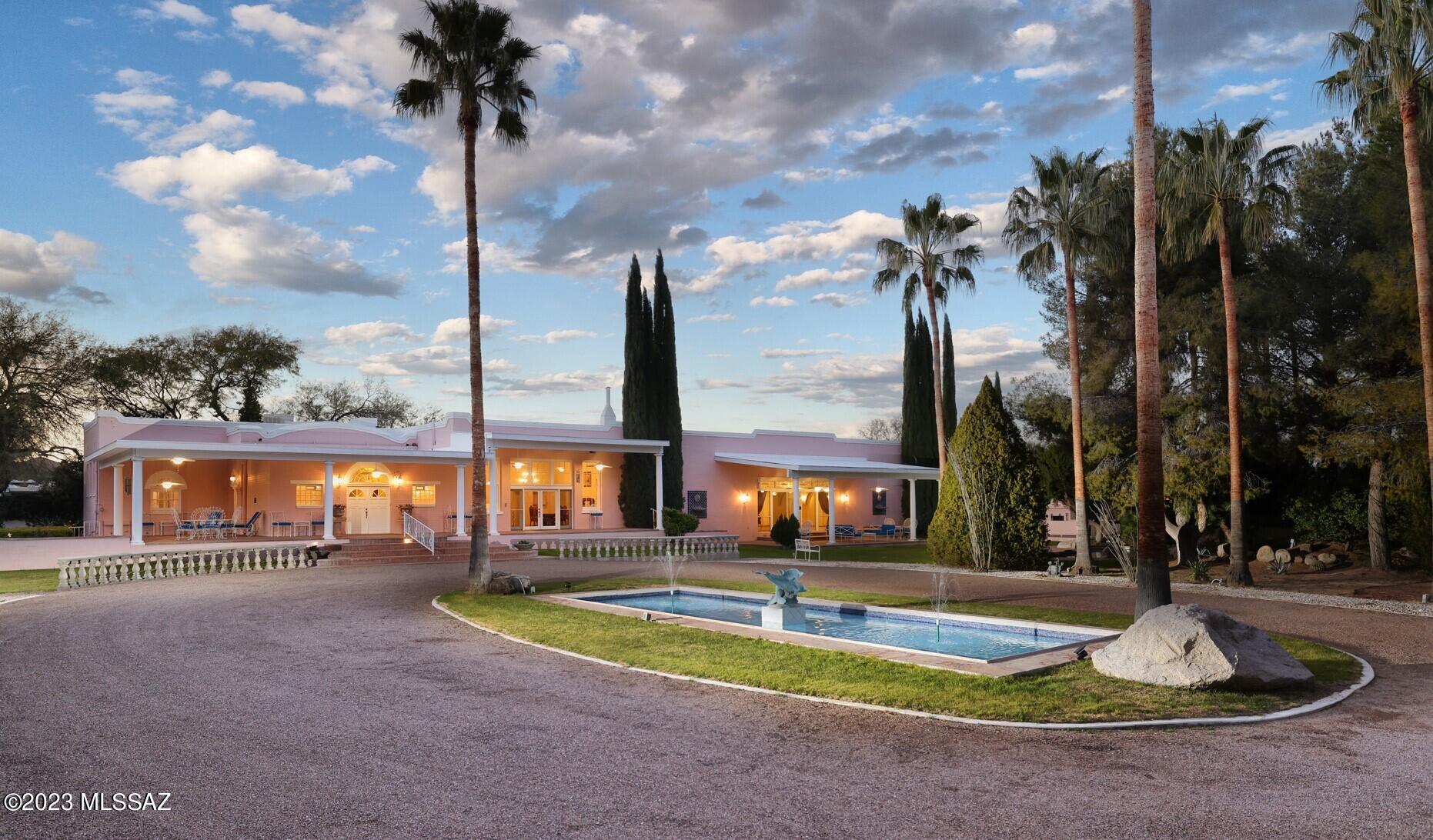 Just 34 miles from the Tucson International Airport, you'll find this Massive, Sprawling, Historic, Resort Hacienda dating back to 1925. Immerse yourself in the charm, character, history and class of a bygone era, when craftsmen took pride in their work and built homes to last for generations, with hand-laid block and plaster walls. Recently restored/updated (over the last 6 months), paying special attention to, and keeping all of the classic elegance of, the original wood ceilings and floors (reminiscent of strolling through historic downtown Tombstone) while adding the more modern comforts you would expect in a home of this caliber. 3 new HVAC units on the main home. Extensively upgraded electrical throughout the property. Roofs on the main home, Guest Casita, and shingled 576 sf studio, are all under 2-year warranty. Gorgeous, lush grounds with automatic irrigation and mature, low maintenance trees create this picturesque, inspirational oasis. New appliances, and far too many new fixtures, upgrades and work to mention here. The adorable guest Casita has 2 BR, 2 BA, kitchen, and is a perfect place for family, friends or rental income. LOTS of storage and outbuildings/workshops, covered parking for 4-5 vehicles, and an additional 576 sf detached building makes a great exercise studio, rec room, art studio, or turn it into an additional guest house or tiny home. It has a brand new mini split HVAC with heat. Over 7300 SF of living space, not including caretaker's quarters and 2900 SF of covered patios. 
The property is also zoned Commercial (B-2) and would make an exquisite venue for weddings, parties and celebrations - or just make it your own Entertainer's paradise or family compound and be the envy of all your guests at your next event. They can even stay the night in the 2 additional queen size Murphy beds hidden in the ballroom! Property has a private well, with high water table, great water pressure and volume. The rich soil in this area grows plants and flowers like magic - a gardener's paradise. Take advantage of the 3 Phase electric or add solar panels to the expansive roof and be completely off grid and independent. Pool has new pump, filter, and integrated in-ground cleaning system, with warranty. New pumps/equipment/electrical in fountains as well.  
  This kind of architecture, character, and history is hard to find. The main home was originally known as the "Old Amado School House" dating back to 1925. It was designed by Annie Graham Rockfellow, the first woman graduate of MIT, and the first woman architect registered in AZ. Most of her later buildings were inspired by the Spanish Colonial Revival and Mission Revival styles, which is very obvious here. Although she received many residential commissions, Rockfellow preferred commercial work. Her more notable contributions to the architecture in Southern AZ include El Conquistador Hotel, Desert Sanatorium, La Fonda Buena Provecho, and The Safford School. 
 Pictures simply do not tell the story, this Malibu-Style estate must be seen in person to truly appreciate the location, views, and privacy from the moment you enter the gates of this enchanting property. Your own personal, private oasis, less than 35 miles from the Tucson International Airport and downtown Tucson. Being only 10 minutes from all of the shopping/conveniences of Green Valley, the Historic Artisan Village of Tubac, easy access to the freeway, and multiple nearby golf courses, makes this home ideally located. Higher elevation means this area is consistently cooler than Tucson, yet only 30 miles away. This is the perfect place to call home and entertain year-round. The feeling of this amazing estate cannot be easily put into words. Please check out the music video and virtual Matterport tour, just click on the arrows on the photo. Furniture sold separately.  Owner will carry and also available for trade. Schedule a showing today! The single wide mobile has no value and is a storage unit.