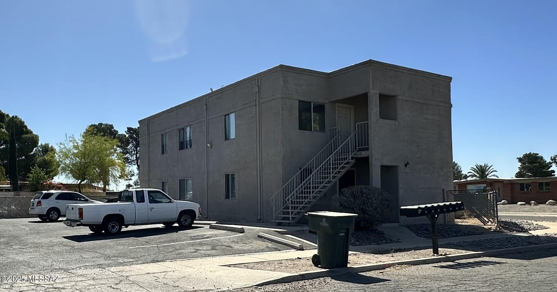Hard to find Eastside rental 4-plex.  May be sold with sister 4-plex MLS 22511463. Buildings are identical except 3809 has 3 units with evap cooling.  The gas is only for the water heater.  Hot water and water, sewer, trash are paid by the owner.  Upstairs units have small balcony.  Studios have large storage closet.  Downstairs have private yards.  Most kitchens have been replaced.  Exterior recently painted.  Roof coated 3-2025 by Southwest Rubberized Roofing with 5 year guarantee.  One owner is a licensed Sales person in the State of Arizona.