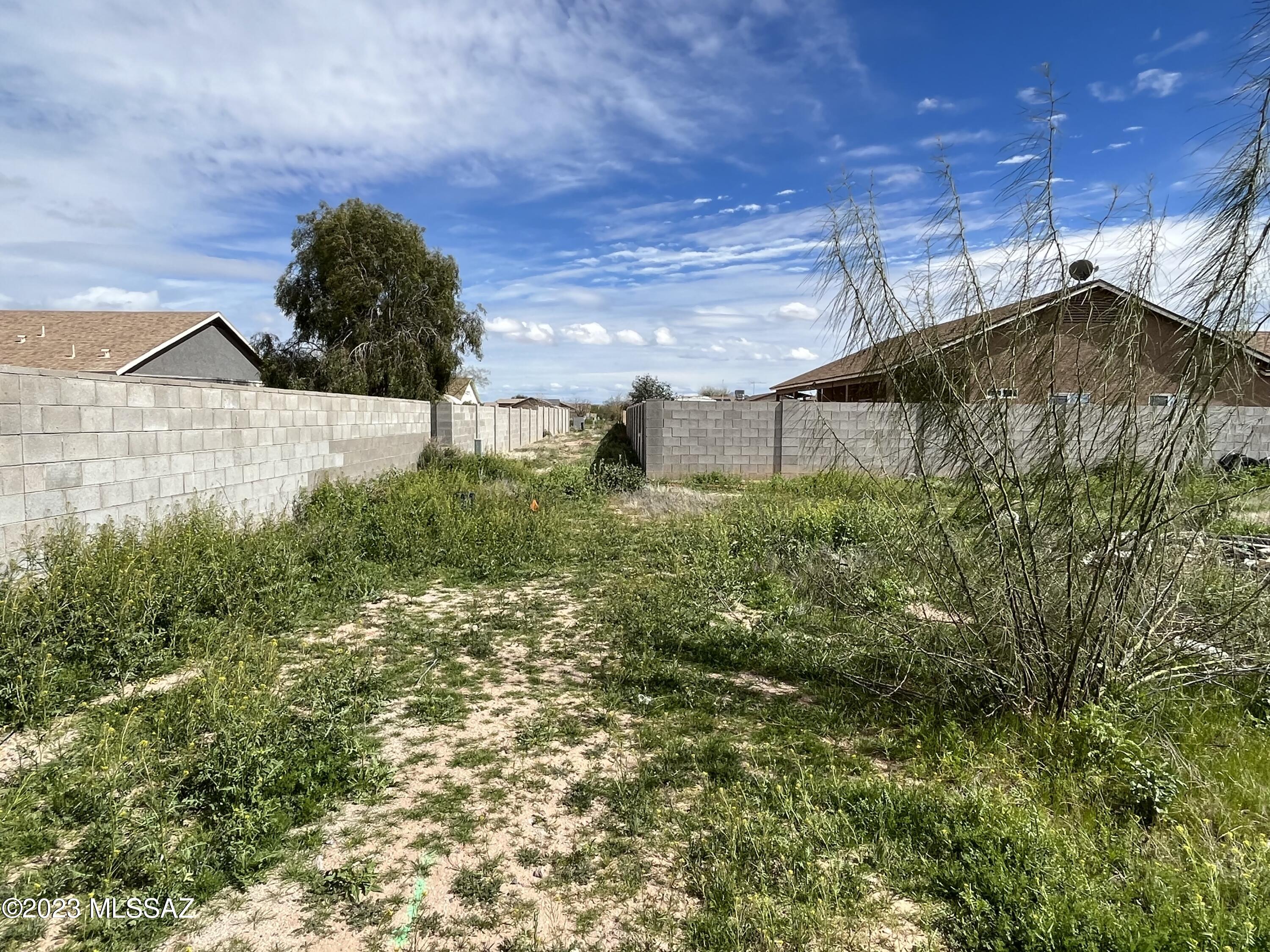 AFFORDABLE OPPORTUNITY to build your dream home in a great location on a large, north/south facing, interior lot less than one hour to Phoenix or to Tucson, and just minutes to I-8. Surrounding lots are developed. Utilities to the property. Neighbors have block fencing already. Close to Arizona City Elementary School. Multiple industries like Lucid, Nikola Motors, Atessa Raceway & Kohler Industries are building/expanding into this area. Tons of amenities close by. Short drive to Casa Grande. Want to golf? Check out the Arizona City Golf Guide at www.golfpass.com. Don't miss this opportunity!
