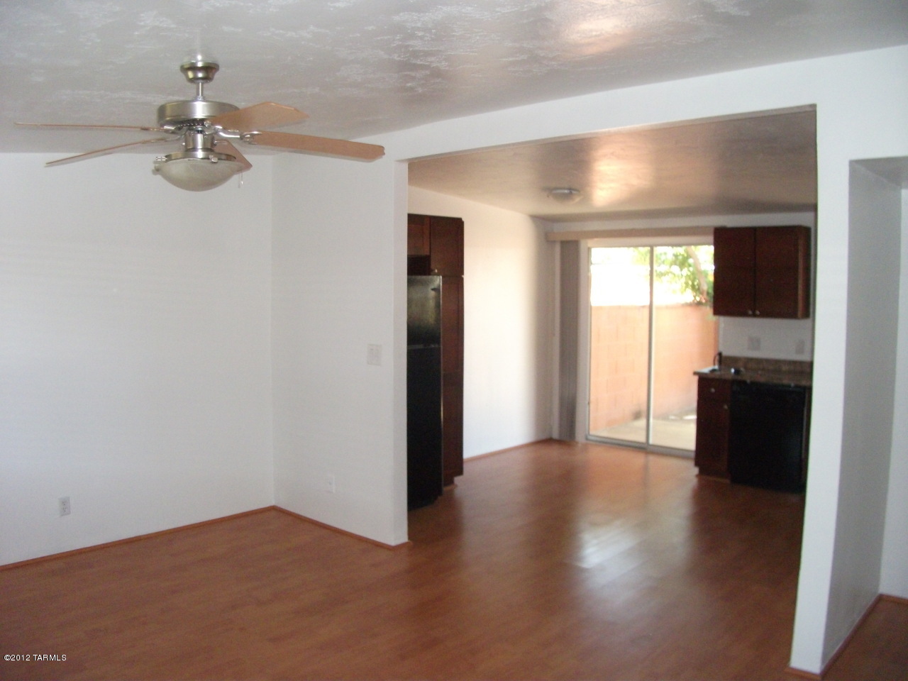 Upgraded, clean 2 BR, 1 Bath Condo in Great Central Location! Park and recreation facilities nearby. Spacious back patio with mature citrus tree.  Easy access to U of A, TMC and bus lines. Single car carport. Storage room with laundry hook-ups. Two community pools and small playground. Water, Hot Water, Sewer and Trash included in Rent. Air conditioned! Immediate availability!