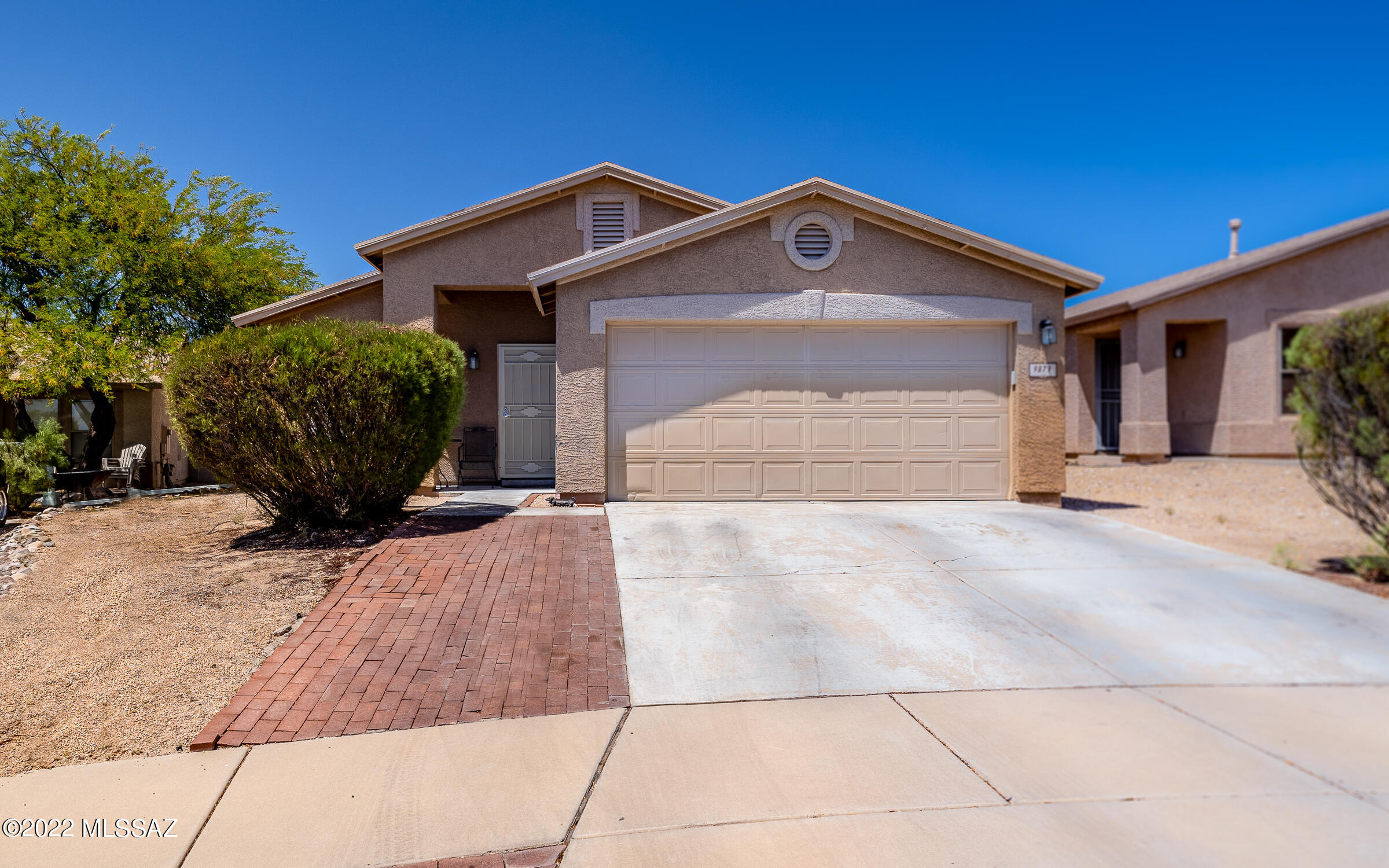 I'm located on Tucson's eastside on a small cul-de-sac street in the popular community of Arizona La Victoria.  My spacious and open floorplan is versatile and great for entertaining your family and friends. The kitchen features a nice- sized pantry and breakfast area and has a  glass sliding door that leads to a north- facing rear yard with mountain views.  Wait till you see my generous sized primary ensuite with its oversized walk-in closet! You'll love my community with its picnic and playground area, a little free library and its easy access to bike and walking trails along Old Spanish Trail. And, the new Northwest Medical Center on Houghton Rd and the Saguaro National Park are just minutes away! Don't Delay, Come Take a Look Today and MAKE IT YOURS!