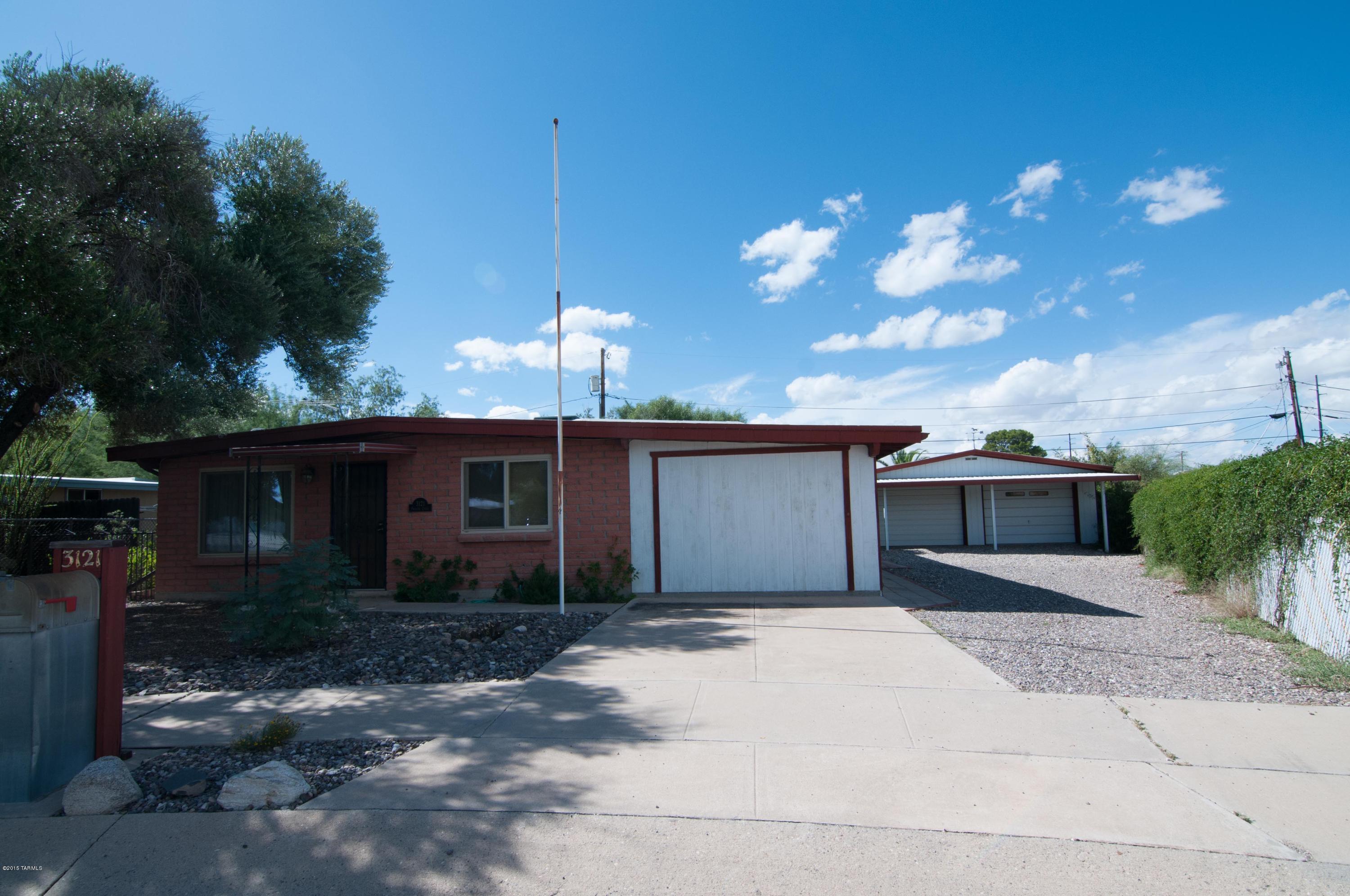 This home has an extra-deep 2-car garage which is well lighted for a workshop and spacious enough for both a car and a workshop. A room with a closet & door & wall-bed can be easily restored to a 3rd bedroom or be used as a den/office. The home has dual pane windows & 260 SF foot bonus room not included in the SF.  A very nice hot tub is included in the sale. Great curb appeal, lots of living space, and located at the end of a cul-de-sac. A must see.