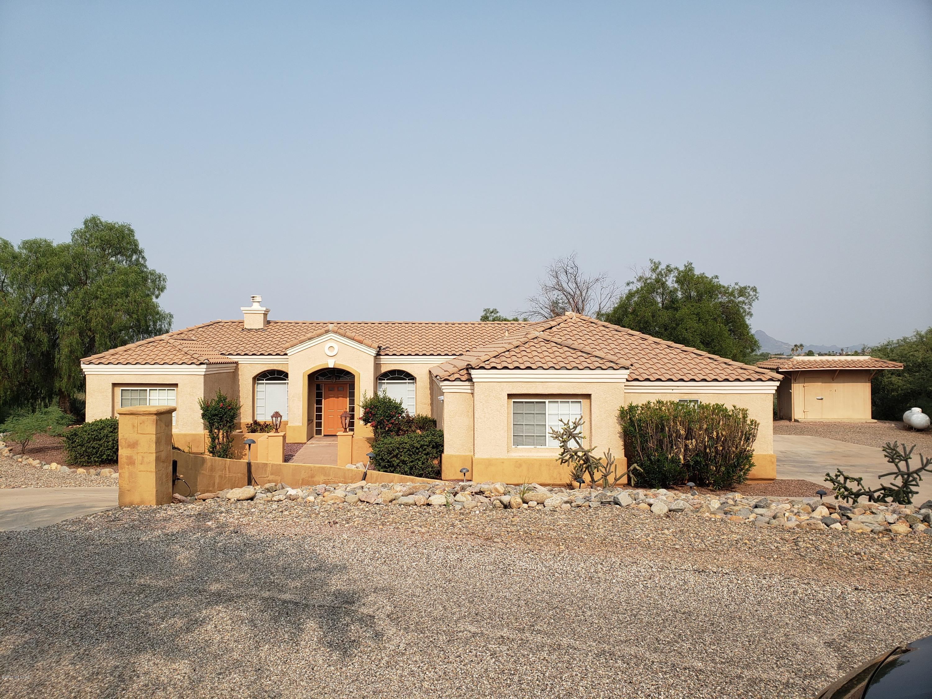 Beautiful home has split floor plan and includes ALL appliances including washer & dryer! Back patio is covered and has GORGEOUS  views of valley. mountains and sunset!
