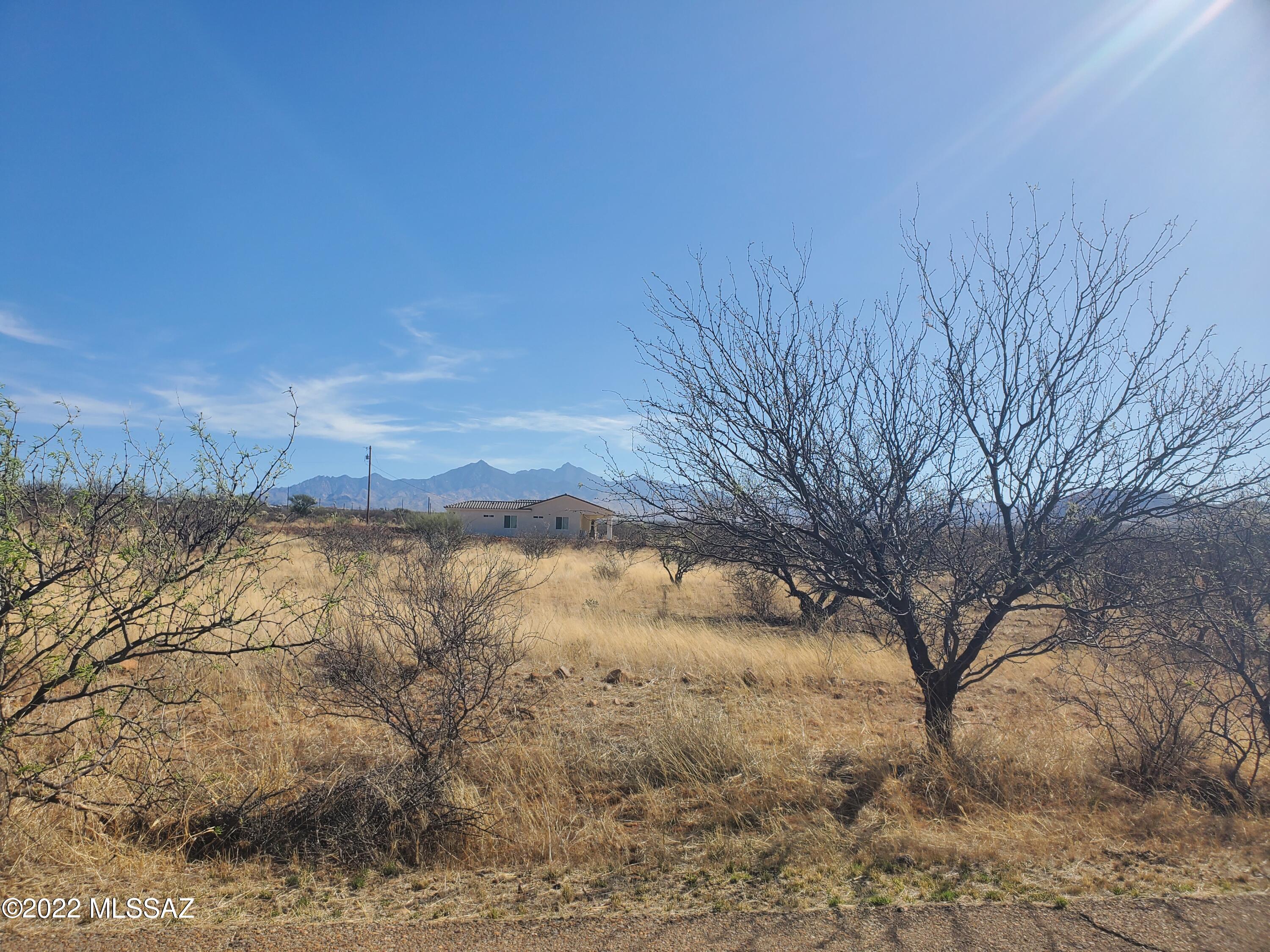 Spacious flat corner lot with gorgeous views.   Electric and water probably at the street; however, should be verified during inspections.  Lot has not had a percolation test.  Near the interstate, schools and shops.