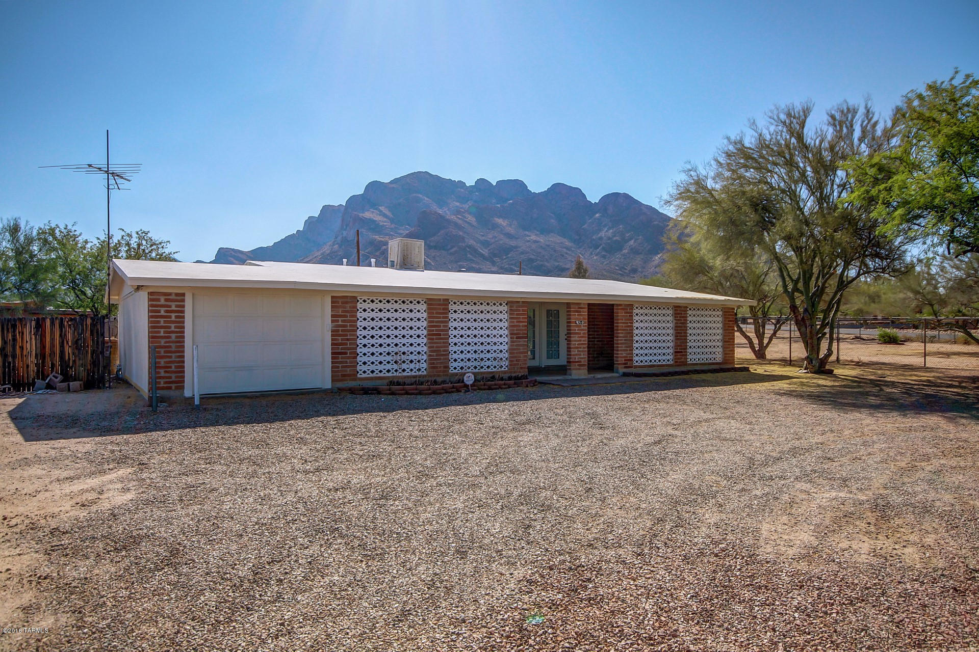 Charming home in Oro Valley waiting for you. Don't miss this opportunity to own this 3 beds, 2 baths home with spectacular mountain views and gorgeous sunrises. Enter and notice the neutral interior palette and  tile flooring through out. Great kitchen space with all appliances included and plenty of cabinets for convenient storage. Energy saving ceiling fans in all bedrooms. The spacious master has an adjoining bath. Separate laundry room. Large lot with a covered patio, above ground spa and low care landscaping. This home is move in ready and waiting for your touches! Come see today!