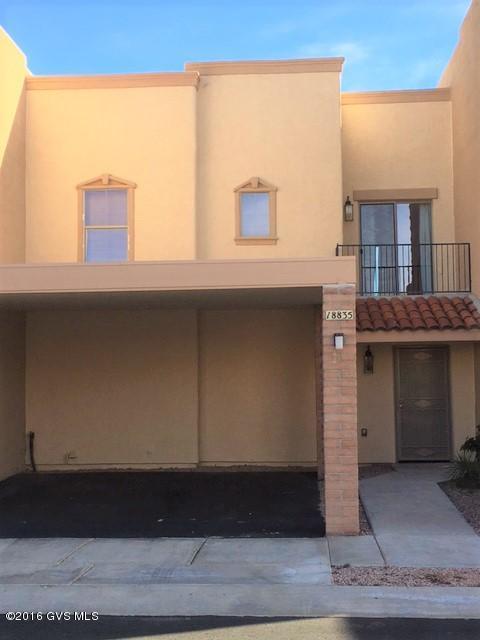 Nicely updated town home located close to shopping and freeway access. Updated flooring to include tile, plush carpet and laminate. A large master bedroom with a big soaking tub, walk in closet, two balconies and mountain views offers a private retreat. 2 additional rooms and a 2nd bathroom upstairs are perfect for kids. Nicely landscaped back yard with additional outside storage. The community has a private pool and work out room for residents to enjoy. All this at an amazing price, you don't want to miss this opportunity!