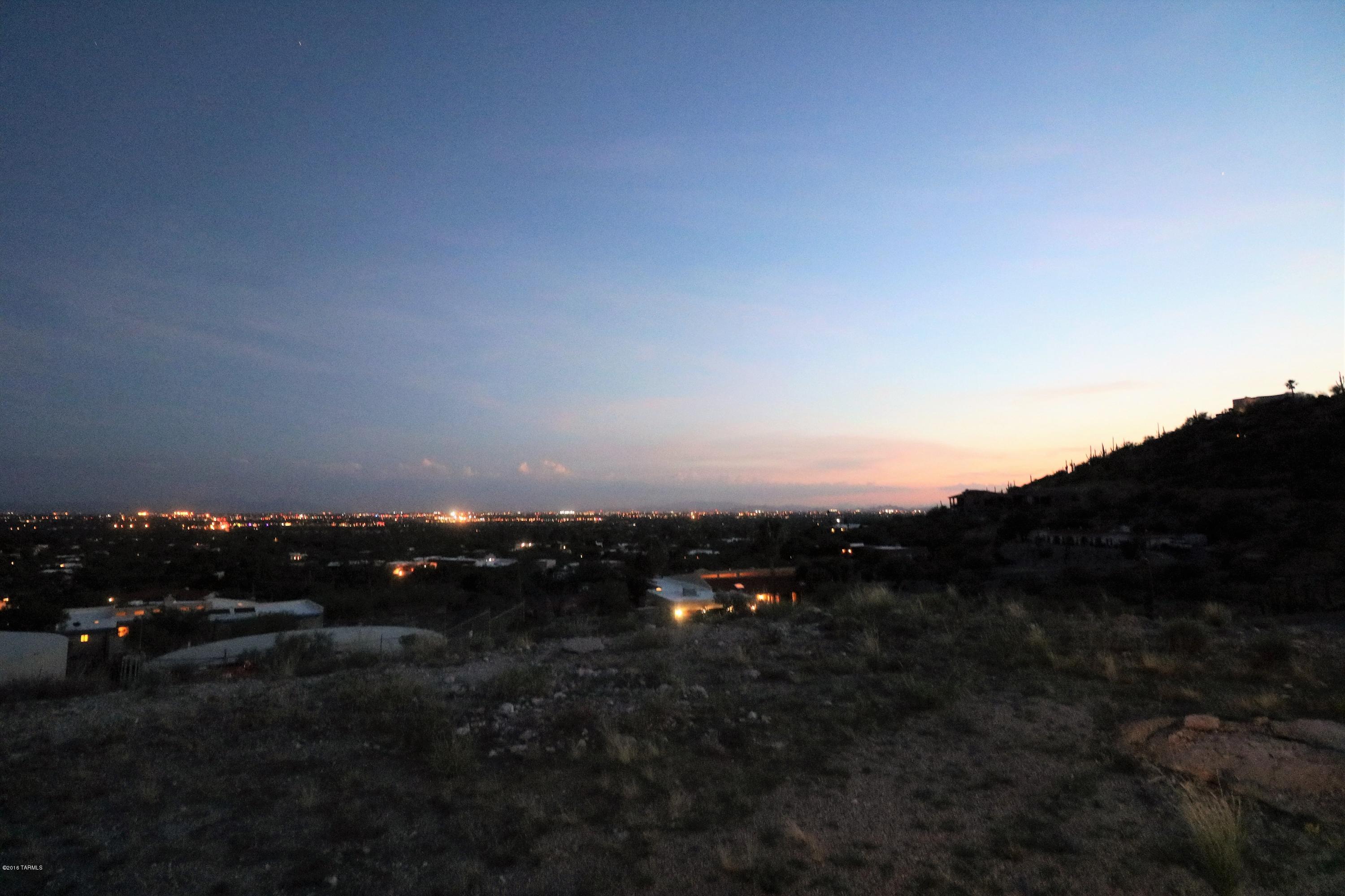 Prime lot in the Tucson Foothills. Beautiful gated community & breathtaking city views on over half an acre. Convenient to shopping, dining & entertainment. Build your dream home today!