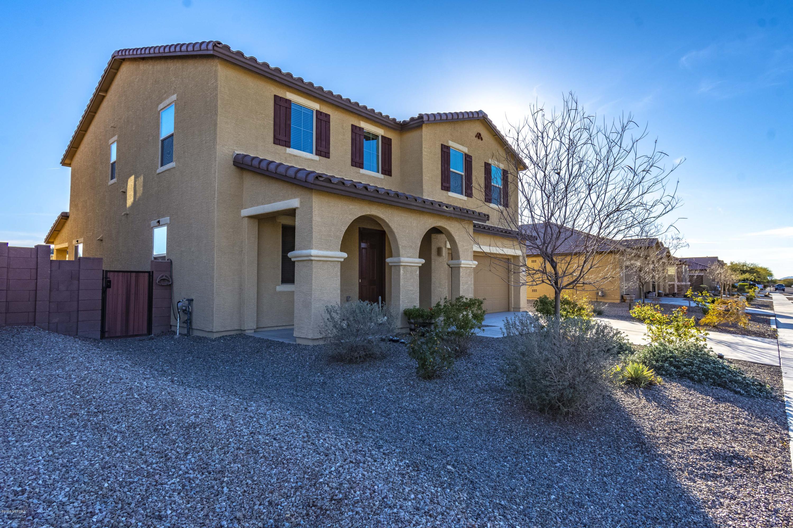 It's July and you're dreaming of a POOL!  Come see this grand 2-story home that sits on a premium lot with breathtaking VIEWS. This home has 3 bedrooms upstairs, a potential 4th bedroom/guest room downstairs behind the living room, an office/formal dining room near the front stairway, and a second family room in the ''loft'' upstairs. All with builder upgrades including 42'' tall dark chestnut cabinets, light GRANITE counters, STAINLESS appliances, custom paint, tile floors, 9' ceilings, landscaped yards and a beautiful PEBBLE TECH SWIMMING POOL facing the Western Sunsets. Richmond American ''Sandra'' floor plan built in the Summer of 2016. Low HOA. BRAND NEW SOLAR system is OWNED, not leased. Solar = HUGE VALUE and low, double digit electric bill for this home priced with built-in EQUITY.