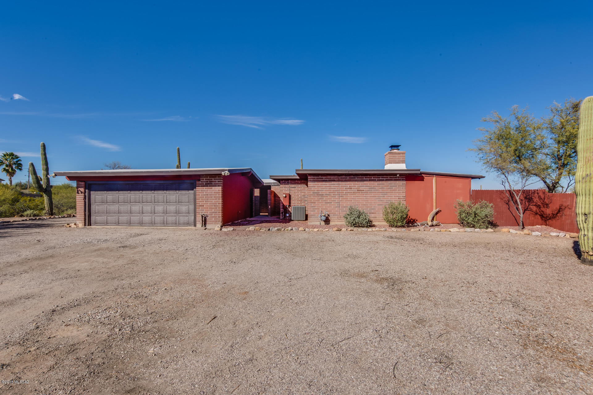 Reduced by $40,0000. Spectacular 4BD (2252 sqft) home located on over an acre in Rancho Del Cerro. Breathtaking views of the mountain ranges on this magnificent lot, perfect for a pool, horses...the possibilities are endless! The home features an open concept with large great room & fireplace that is adjacent to a large Arizona Room perfect for entertaining! Master bedroom has a walk-in closet & upgraded master bathroom. Additional notables include A/C & furnace replaced in 2013, Range dishwasher and refrigerator replaced in 2012, lighting replaced in kitchen and dining room in 2013 & new hot water heater in 2016. This home is a truly a must see!