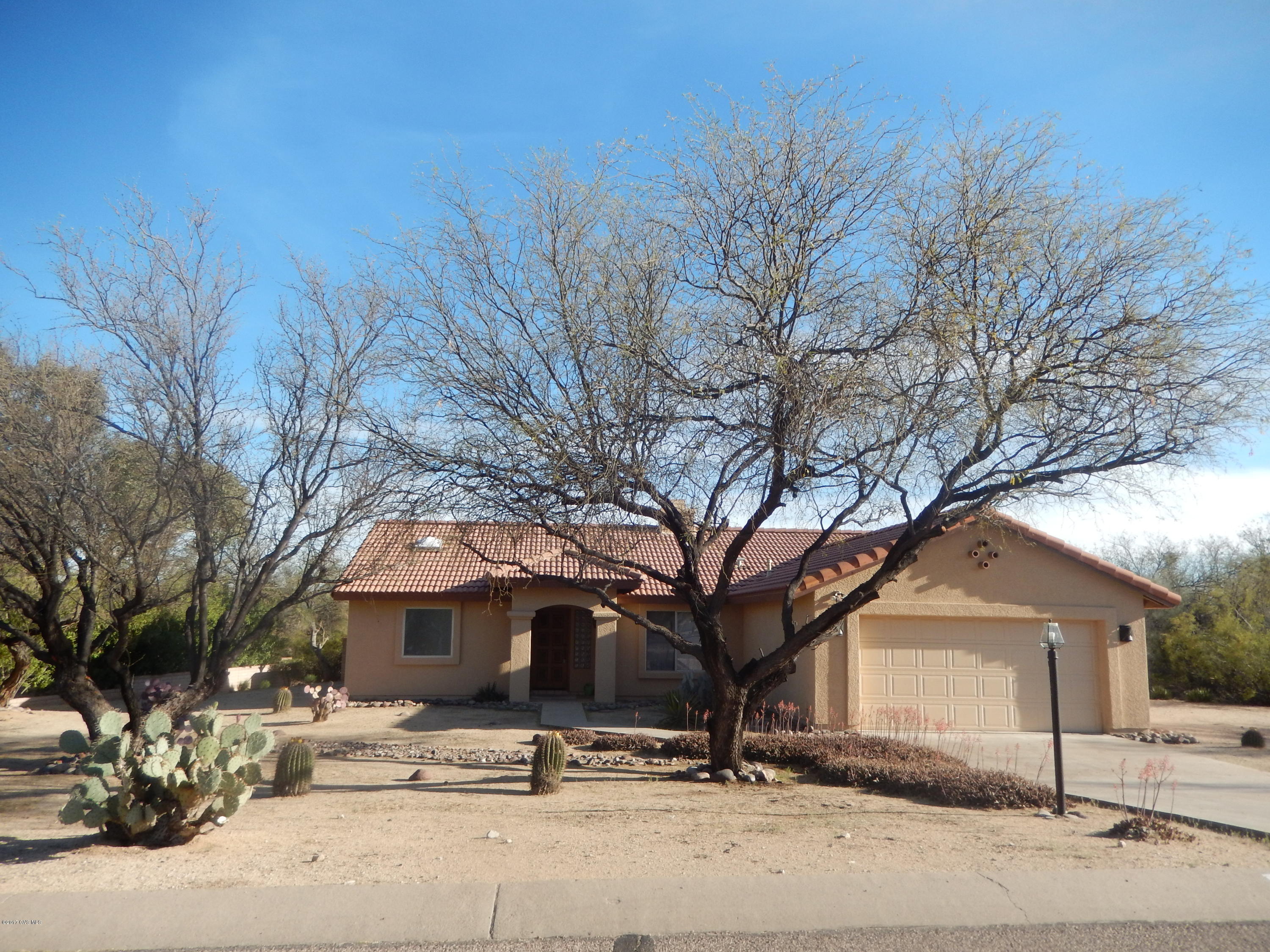 Great family home on large lot ready for you to make your own! Mountain views from the back covered patio with lots of privacy and large side yards. Open great room with split bedroom plan. Cozy gas 2-sided fireplace, nook plus dining area, skylights, jetted tub, soft water loop, and 2-car garage. Tile roof.